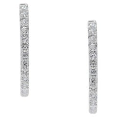 Boucles d'oreilles éblouissantes en or blanc 18 carats et diamants naturels de 0,75 ct.