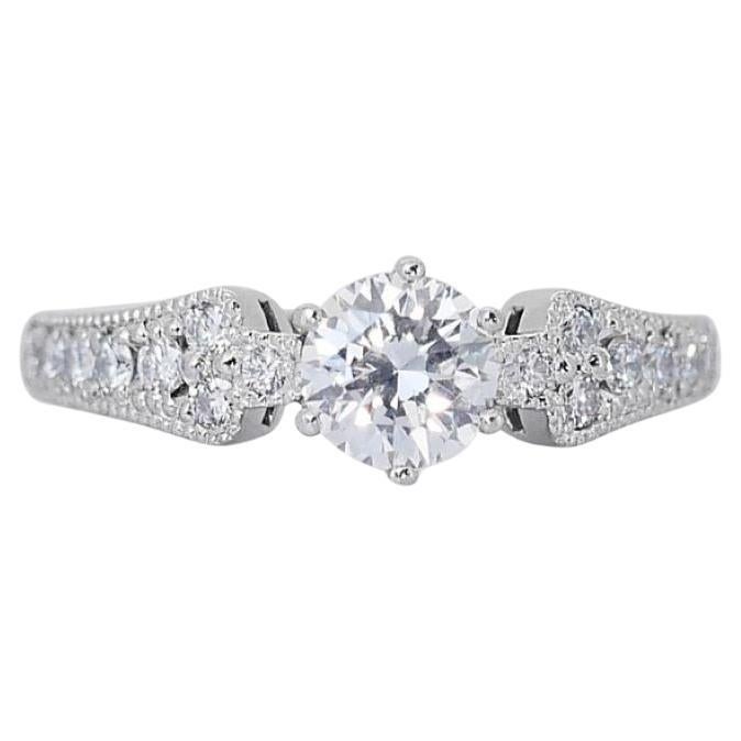 Dazzling 0.8 Carat Round Diamond Ring with Halo in 18K White Gold For Sale