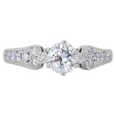 Dazzling 0.8 Carat Round Diamond Ring with Halo in 18K White Gold