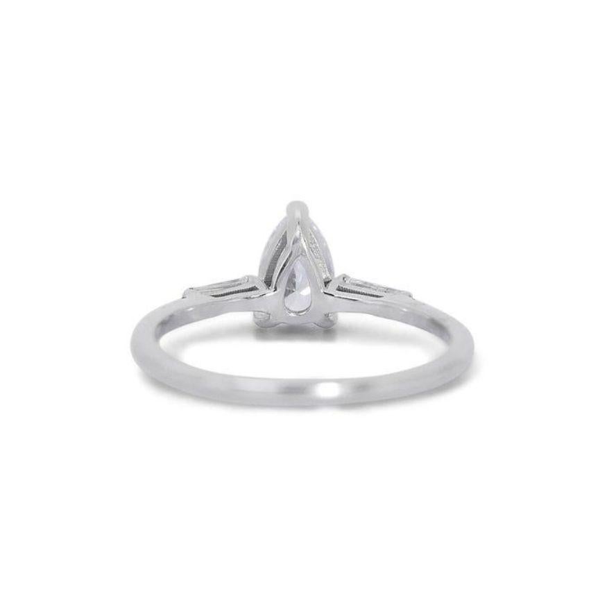 Women's Dazzling 0.95ct Pear Diamond Ring set in 18K White Gold For Sale