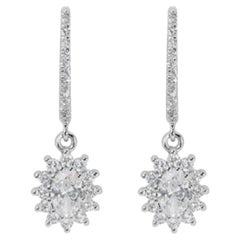 Boucles d'oreilles éblouissantes en or blanc 18 carats et diamant ovale de 1,01ct