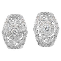 Boucles d
oreilles éblouissantes en or blanc 18 carats de 1,25 ct de diamants - certifiées IGI