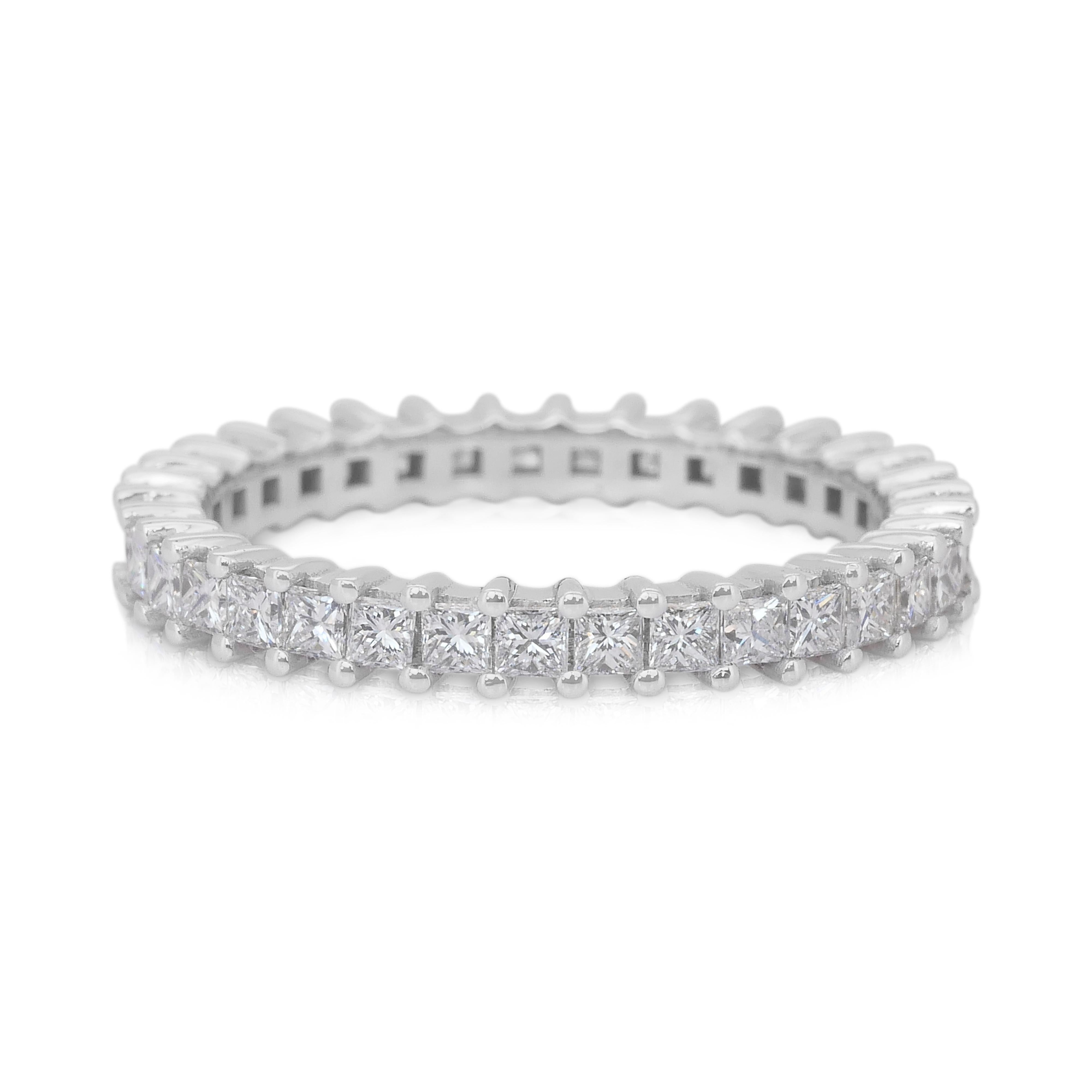 Dazzling 1.30ct Diamonds Eternity Ring in 18k White Gold - IGI Certified

Celebrate everlasting elegance with this refined 18k white gold eternity ring, adorned with 35 princess-cut diamonds totaling 1.30 carats. The geometric sparkle of the