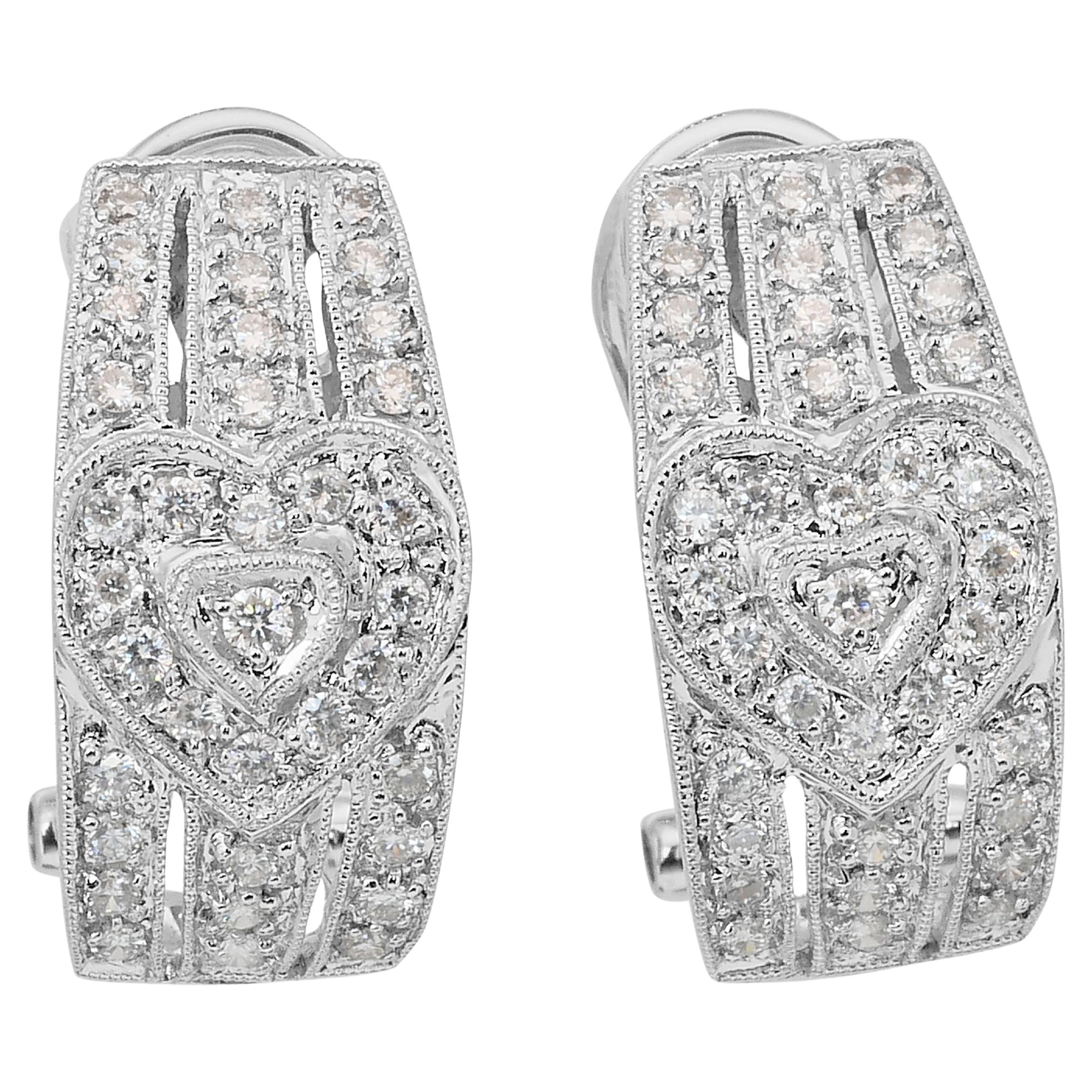 Boucles d
oreilles éblouissantes en or blanc 18 carats de 1,36 ct de diamants - certifiées IGI