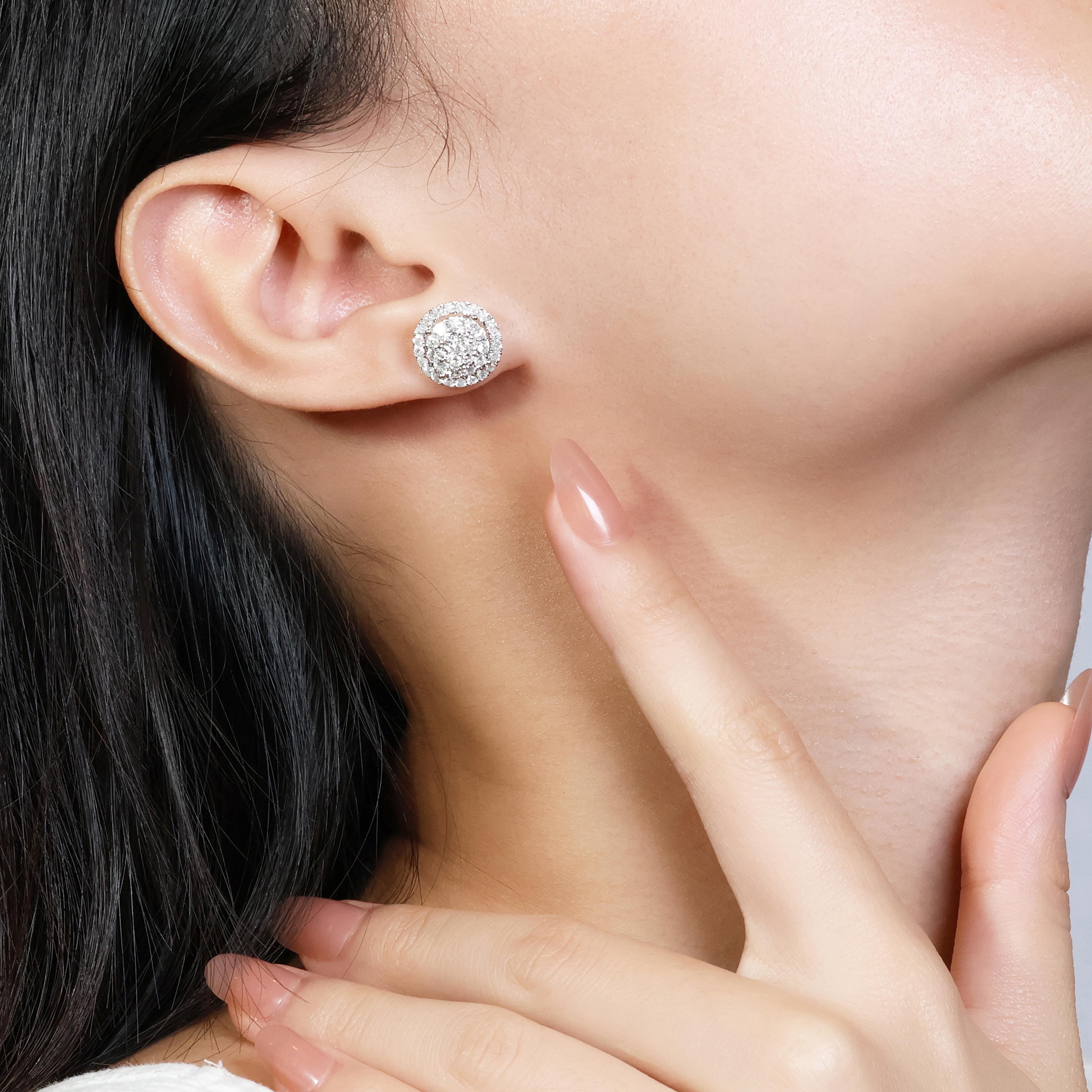 Make a dazzling statement with these stunning 18K white gold diamond earrings. Featuring 78 round brilliant diamonds with a total carat weight of 1.44 carats, these earrings boast an I color grade and SI clarity, offering a brilliant display of