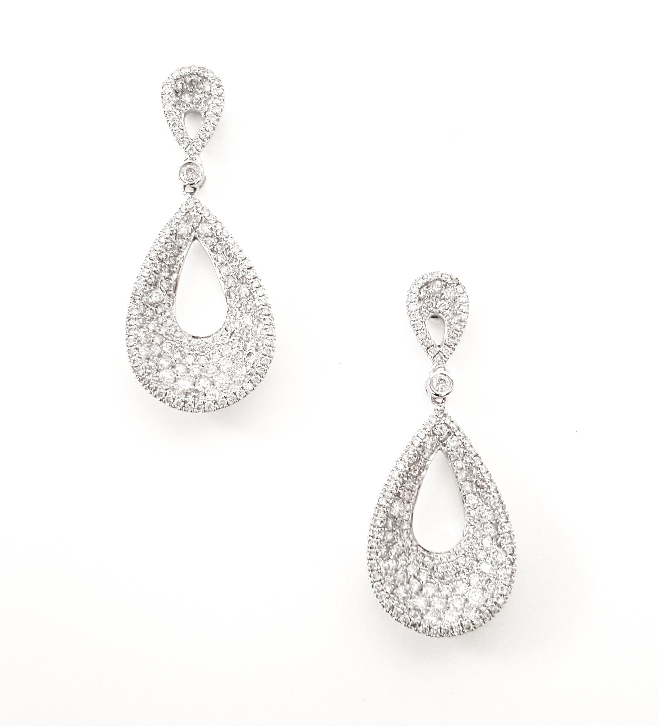 Embrace the brilliance of these dazzling 14 karat white gold diamond dangling earrings, a masterpiece of modern elegance. Each earring features a captivating 1.82 carat round-cut diamond, expertly set within a unique concave design, creating an