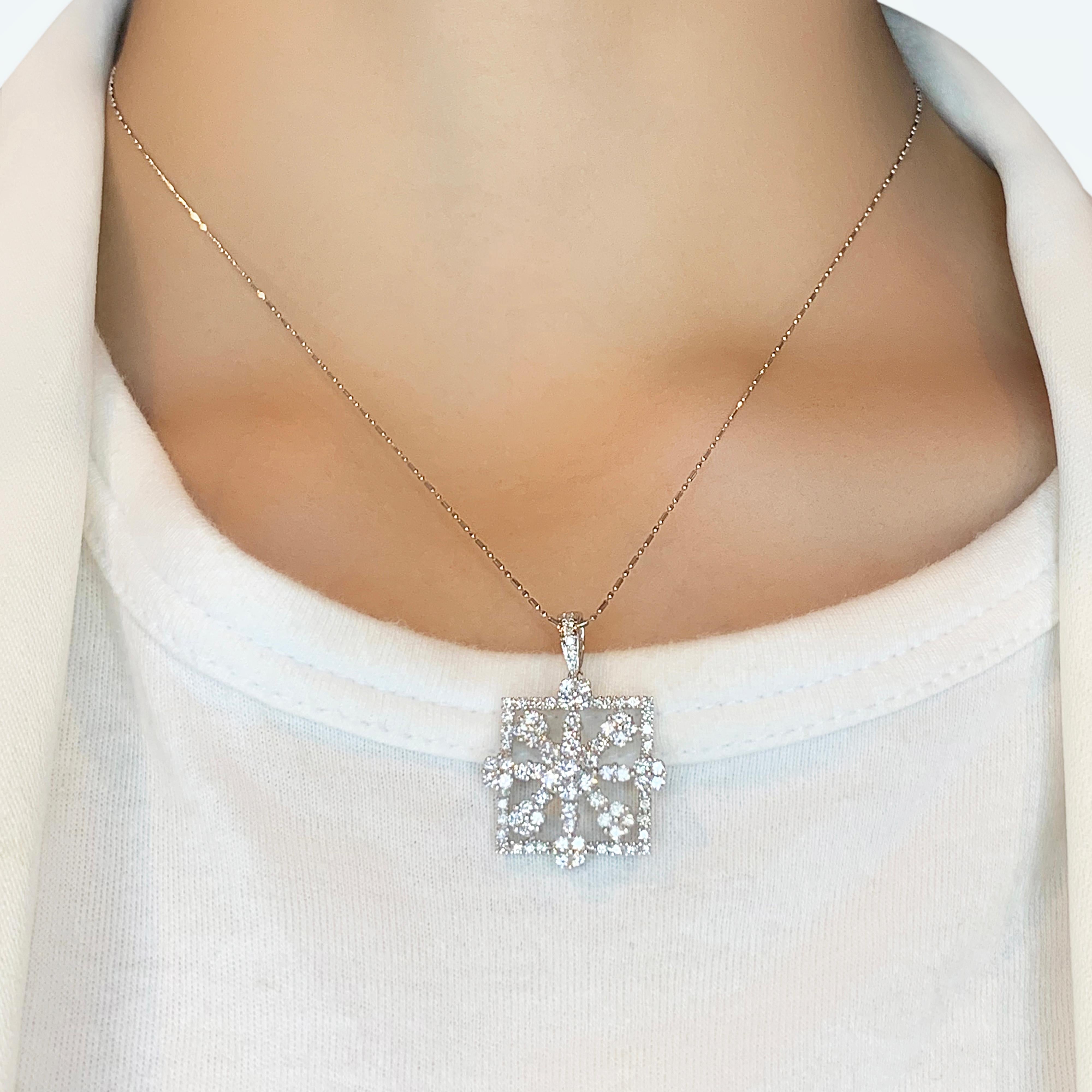 Add a touch of luxury with this stunning pendant, meticulously crafted in 18K White Gold. The pendant features 83 round brilliant natural diamonds as the main stones, with a total carat weight of 1.66ct. Each diamond boasts a G color grade and VS