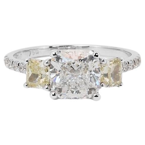 A gorgeous three stone ring with a dazzling 1.81 carat cushion natural diamond. It has 0.76 carat of side diamonds which add more to its elegance. The jewelry is made of 18K White Gold with a high-quality polish. It comes with AIG certificate and a