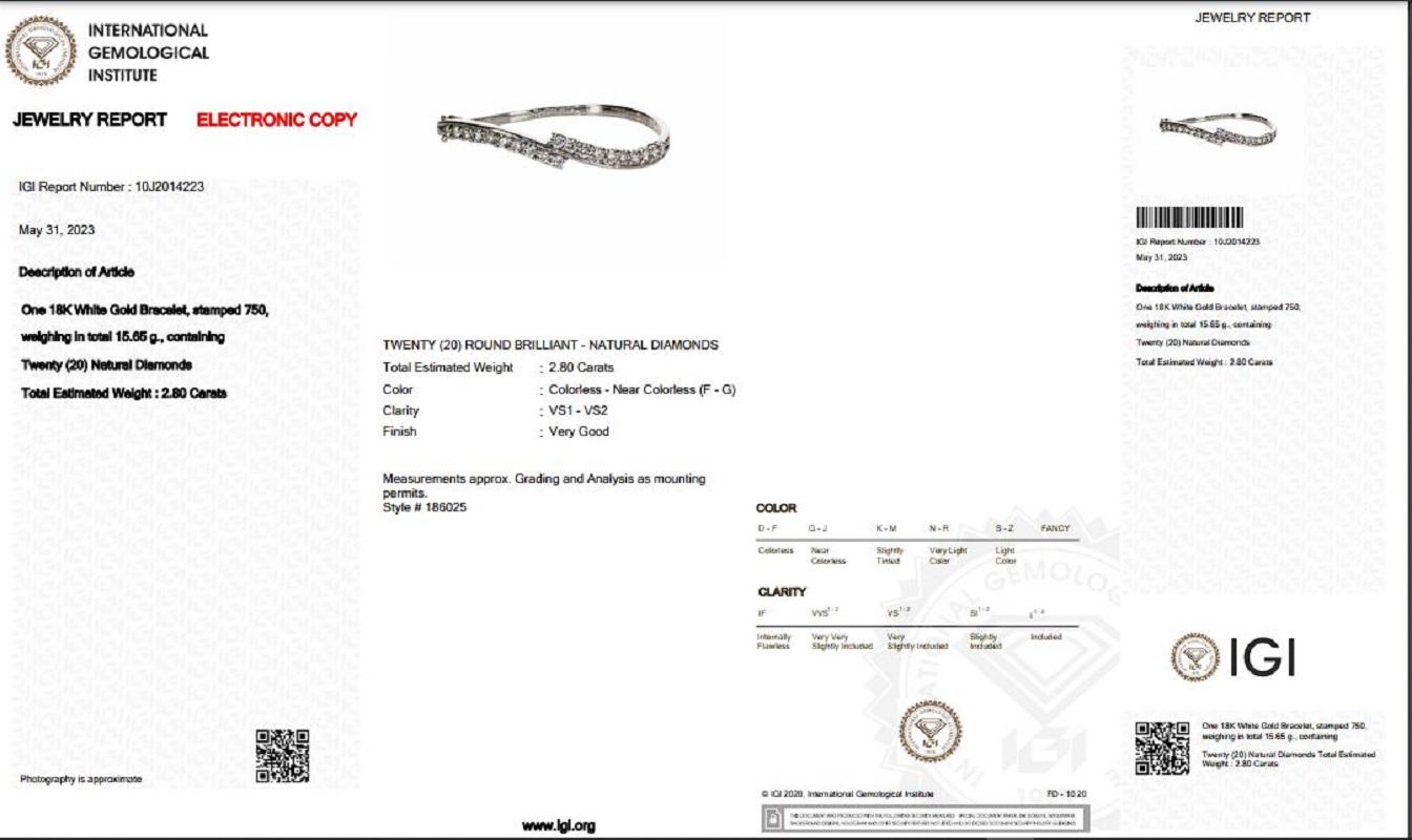 An elegant bangle with dazzling 2.8-carat round brilliant diamonds. The jewelry is made of 18K White with a high-quality polish. It comes with an IGI certificate and a nice jewelry box.

20 diamonds main stone of 2.8 carat
cut: round