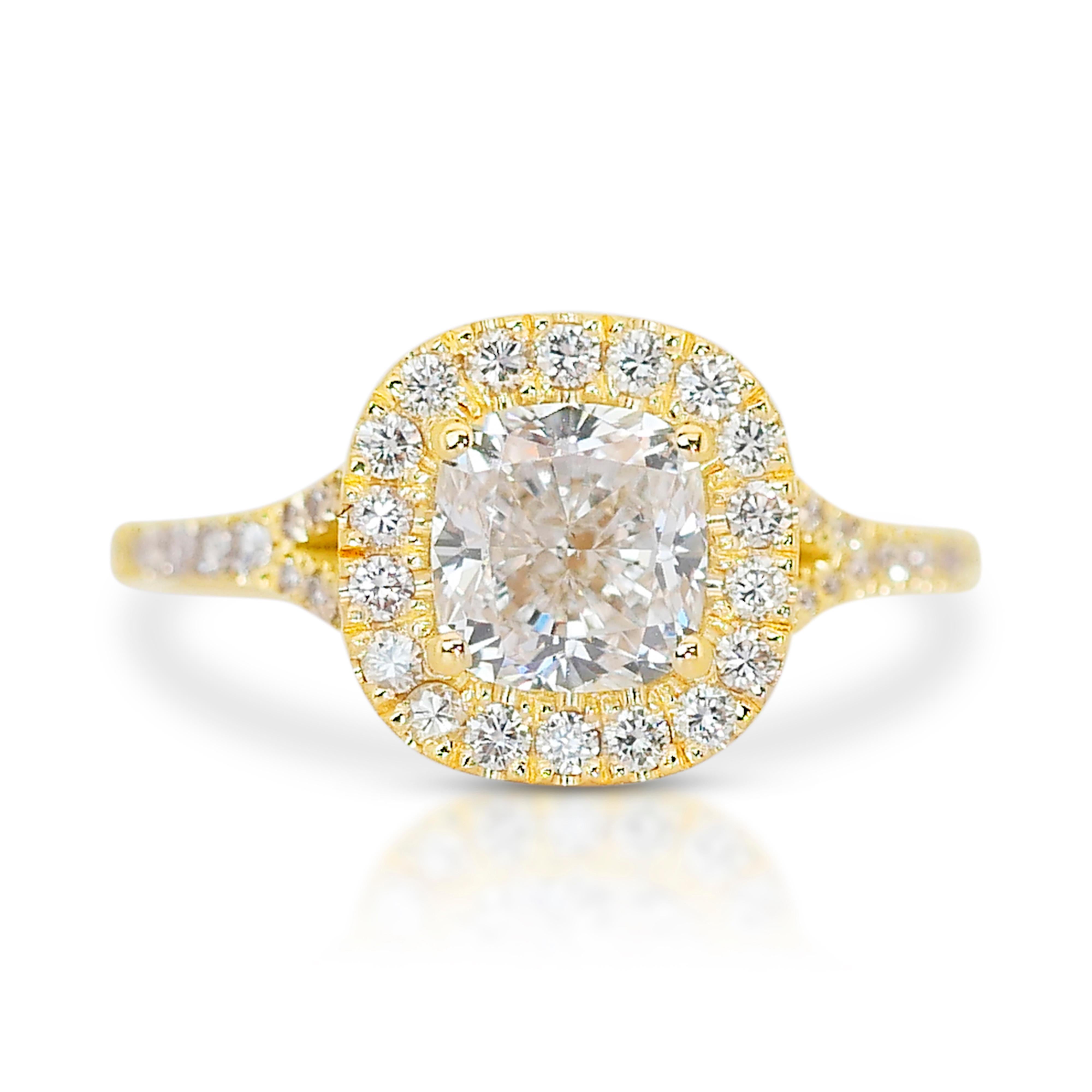 Dazzling 18k Yellow Gold Diamond Halo Ring w/1.85 ct - IGI Certified

Immerse yourself in the epitome of sophistication with this exquisite 1.85-carat total-weight diamond halo ring, masterfully crafted in lustrous 18k yellow gold. At the heart of