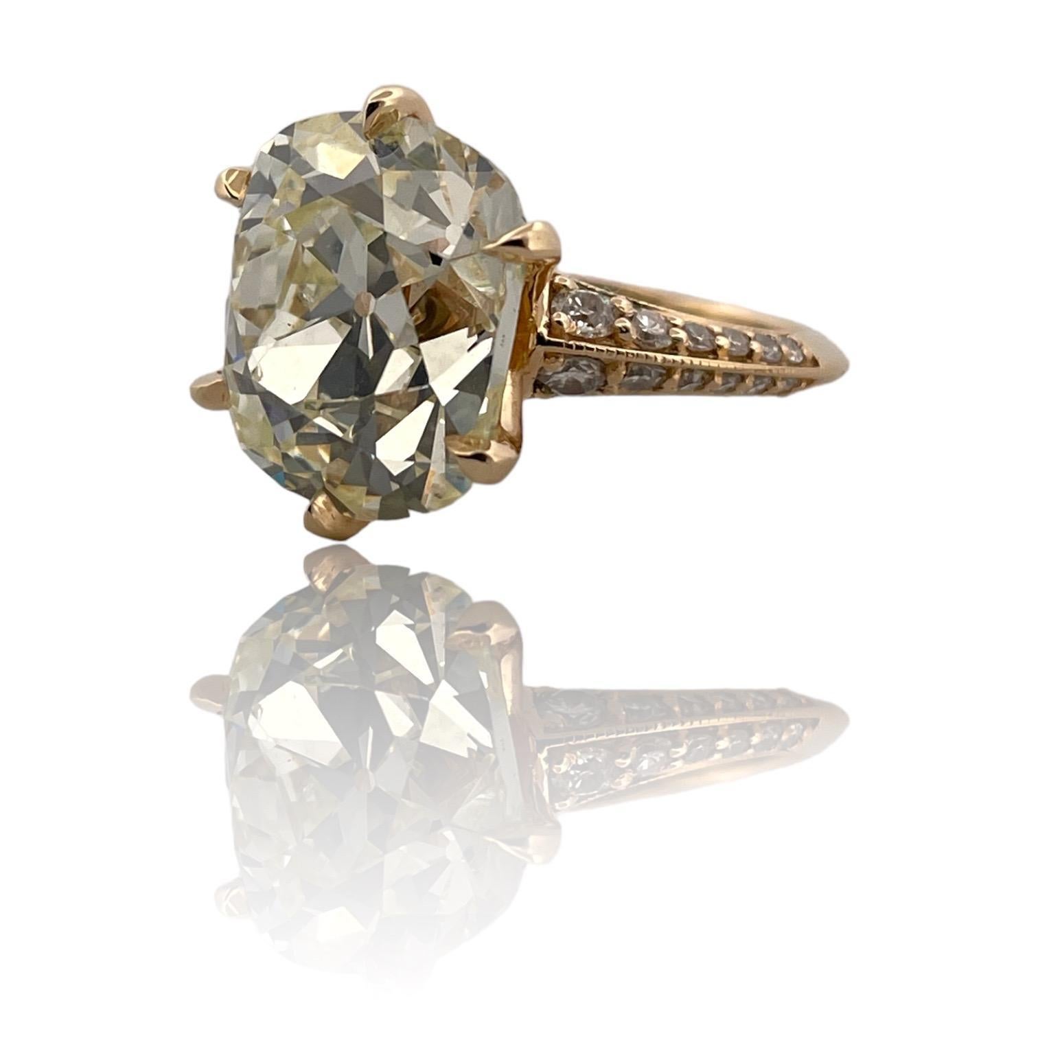Step into a world of unparalleled radiance with our Dazzling 18K Yellow Gold Diamond Ring, boasting a total weight of 10.08 carats of natural diamonds. Each stone is meticulously chosen for its cut, color, and clarity, ensuring a breathtaking