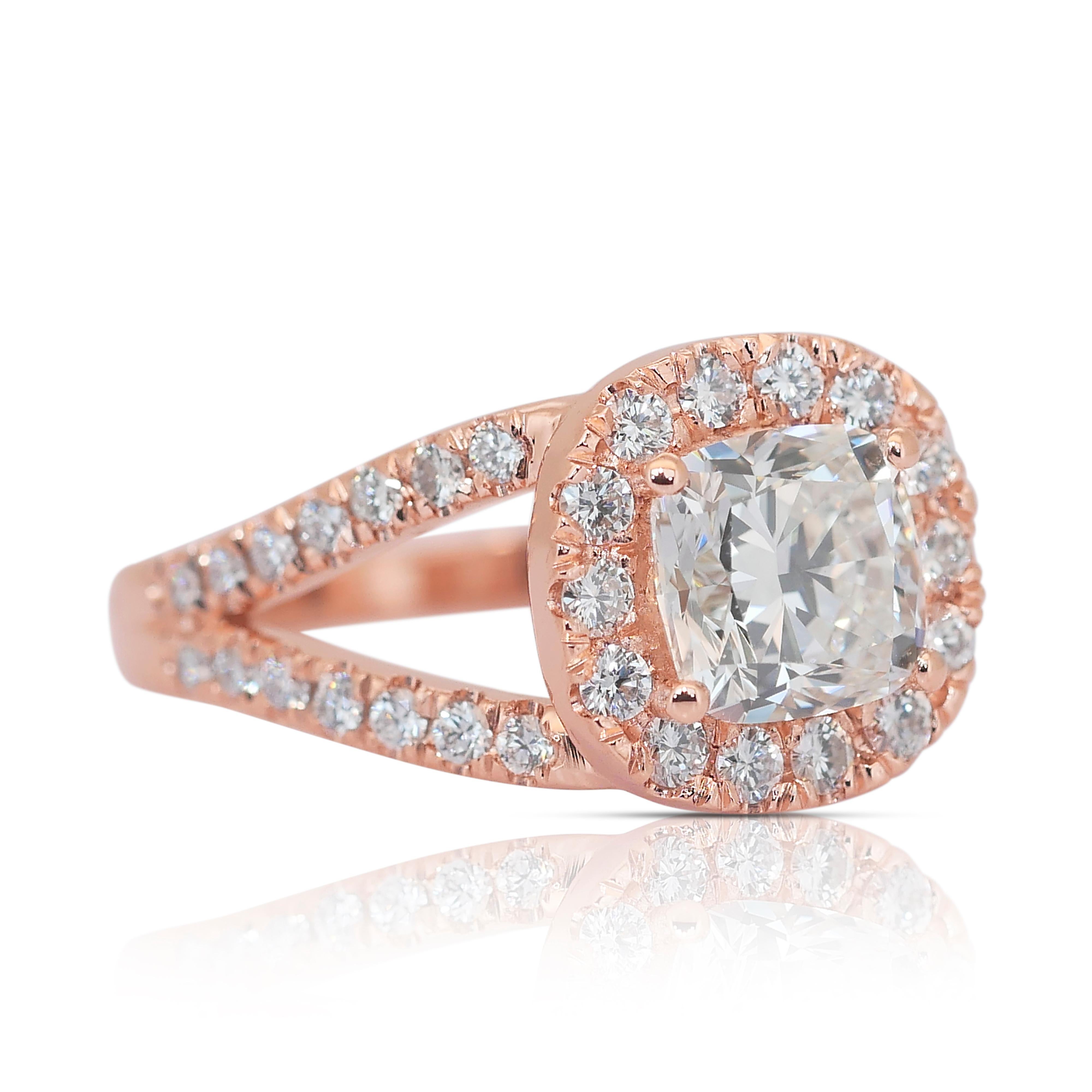 Dazzling 2.09ct Diamonds Halo Ring in 18k Rose Gold - IGI Certified

A captivating blend of elegance and warmth, this 18K rose gold diamond ring features a stunning 1.51ct cushion-cut center diamond radiating timeless brilliance. Surrounding the