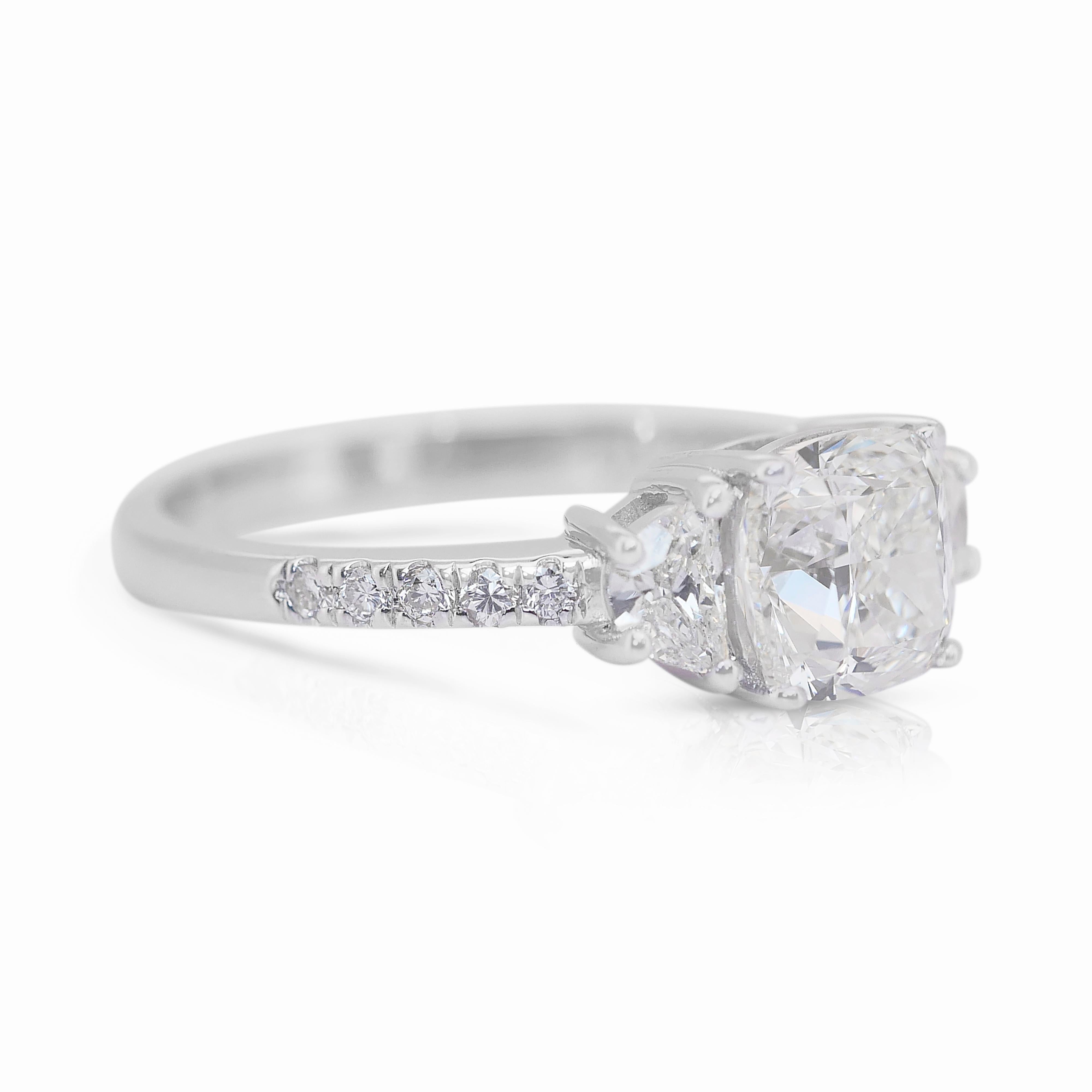 Dazzling 2.20ct Diamonds 3-Stone Ring in 18k White Gold - IGI Certified

Experience the epitome of elegance with this 18k white gold diamond ring. At its center lies a stunning 1.70ct cushion-cut diamond, radiating timeless brilliance. Flanking the