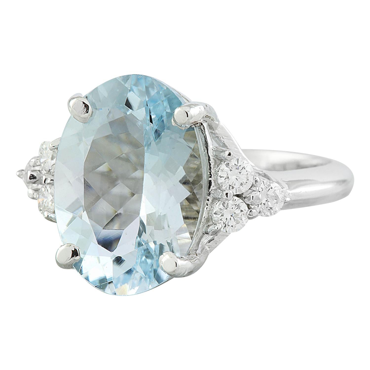Embrace the allure of understated elegance with this mesmerizing Natural Aquamarine Diamond Ring, meticulously crafted in solid 14K White Gold. Weighing an impressive 5.32 carats in total, this ring is a true statement piece, exuding grace and