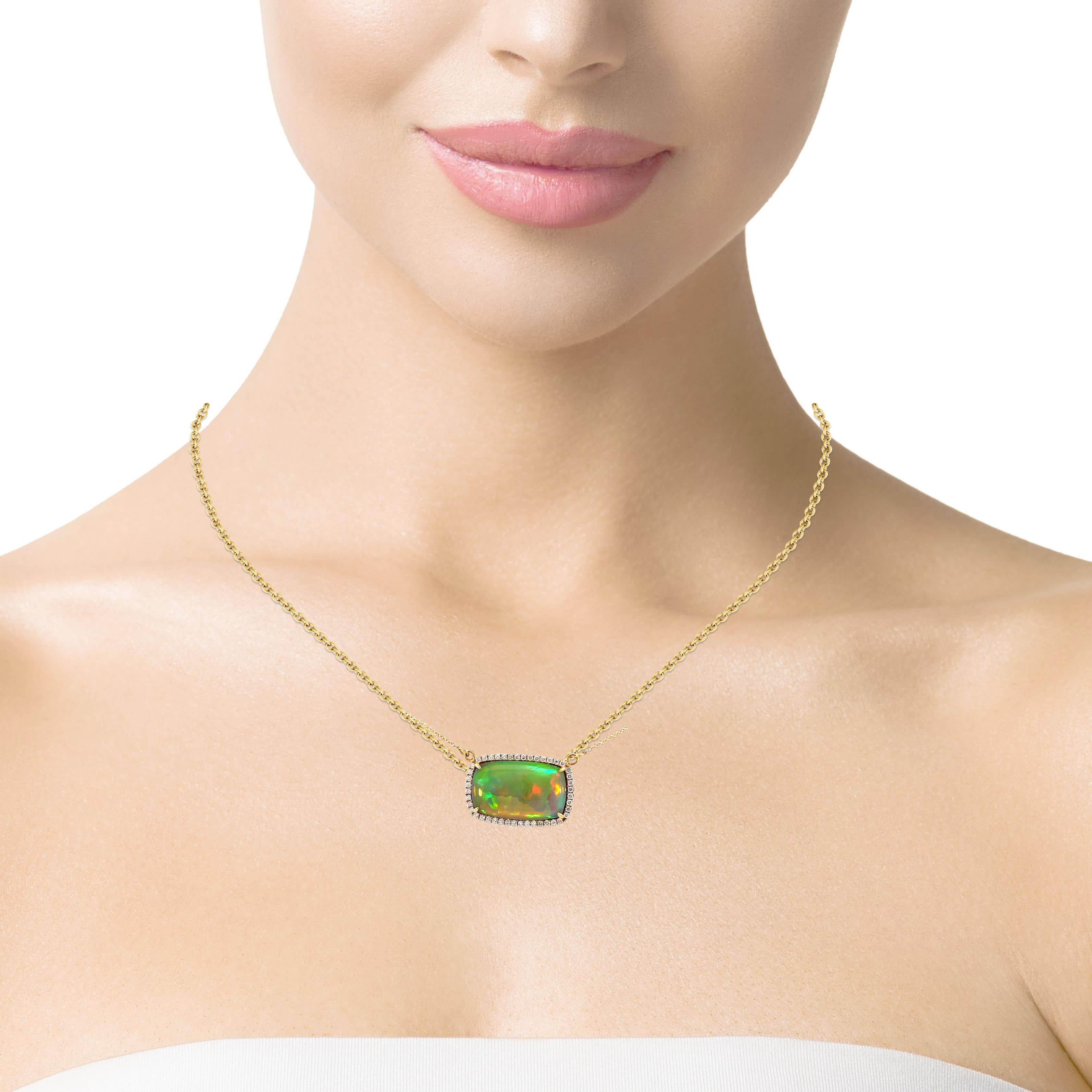 Presentamos nuestro exquisito Collar de Oplita y Diamantes con Cadena de Oro, el accesorio perfecto para añadir un toque de elegancia y glamour a cualquier conjunto. Este collar, elaborado con la máxima precisión, presenta un encantador colgante que