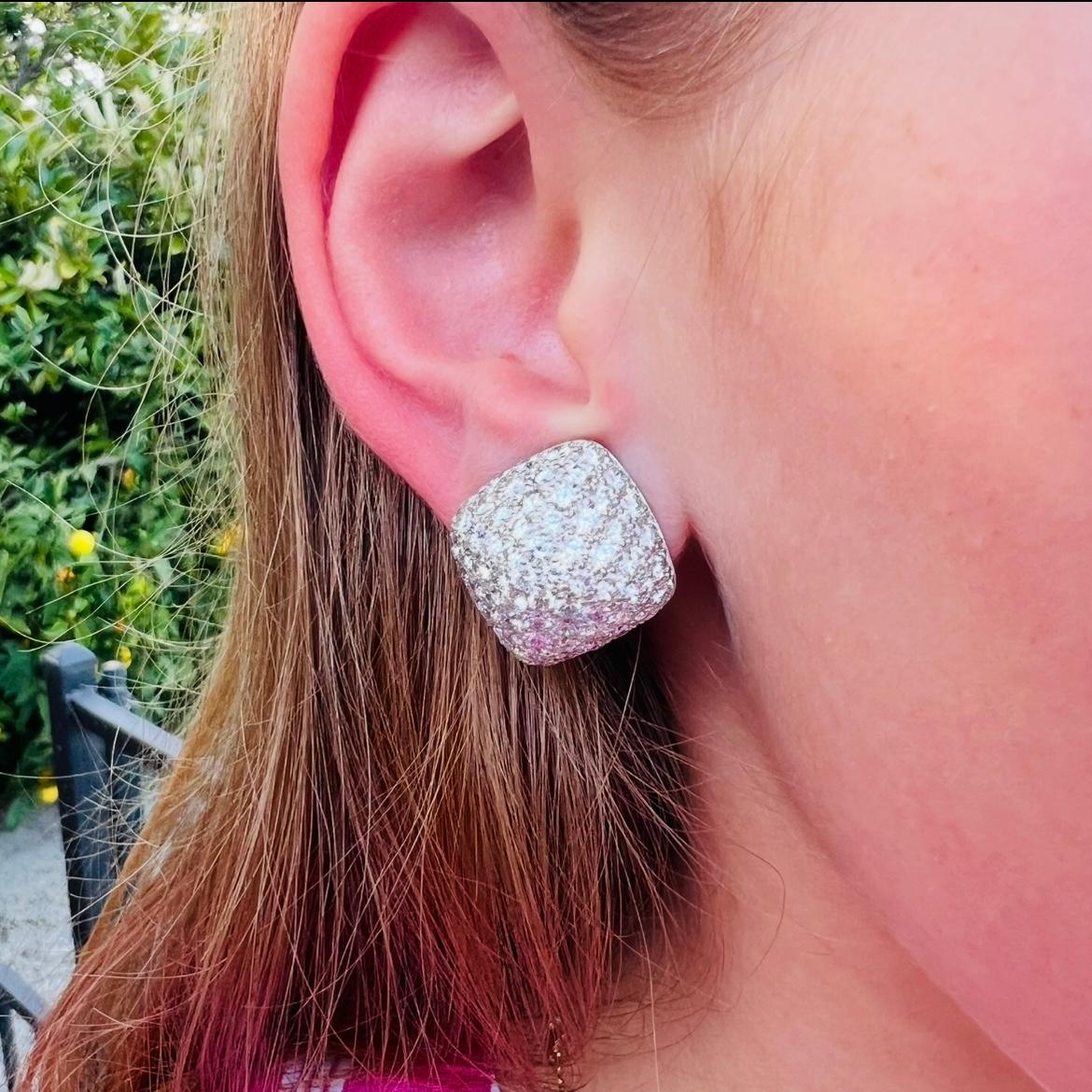 For over 100 years, Oscar Heyman has been crafting some of the most incredible jewelry in the world from their New York City atelier, and this pair of natural diamond ear clips is no exception. Featuring over 10 carats of fine white natural diamonds