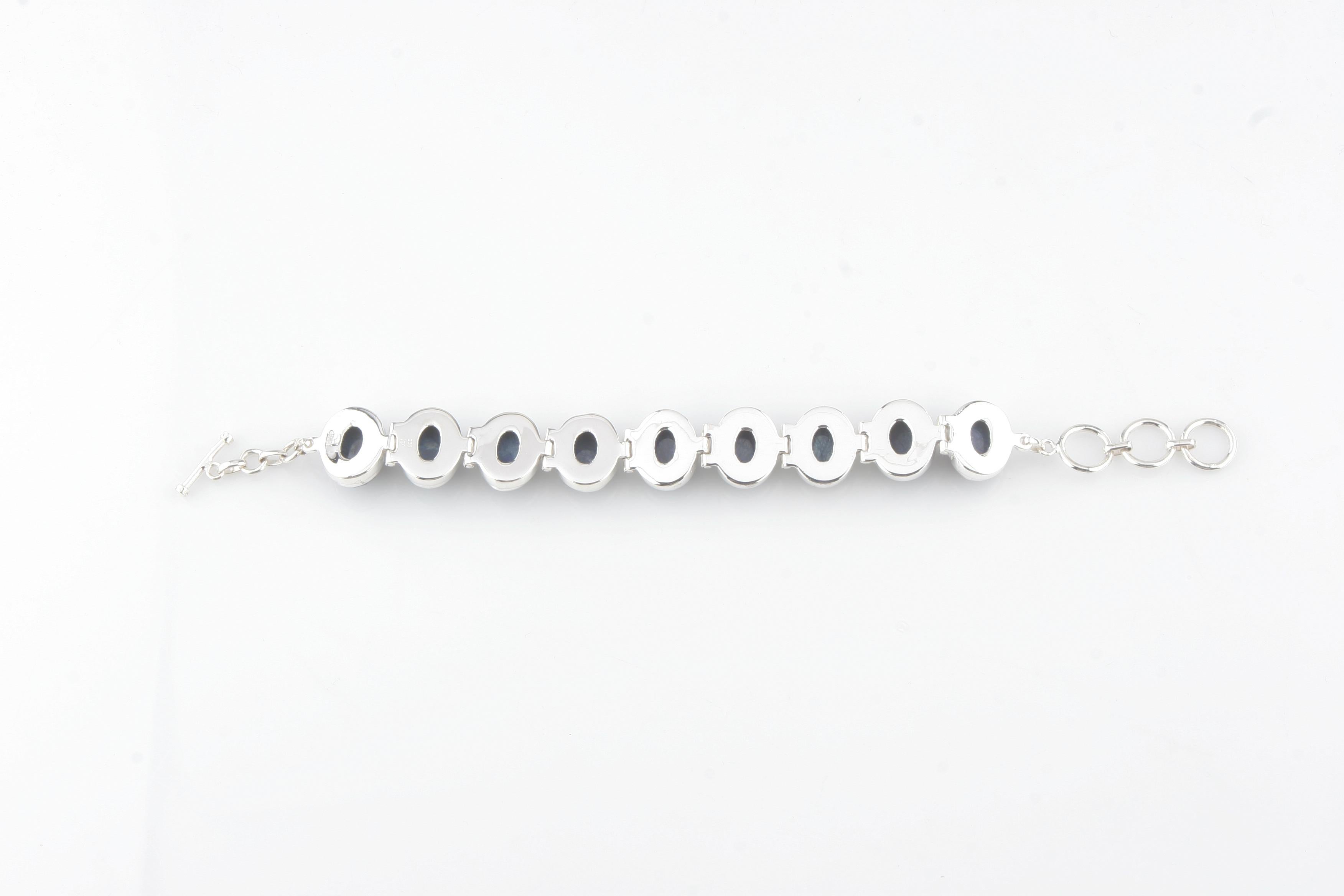 Deslumbrante pulsera de plata de ley con zafiro en bruto facetado, talla 9 Moderno en venta