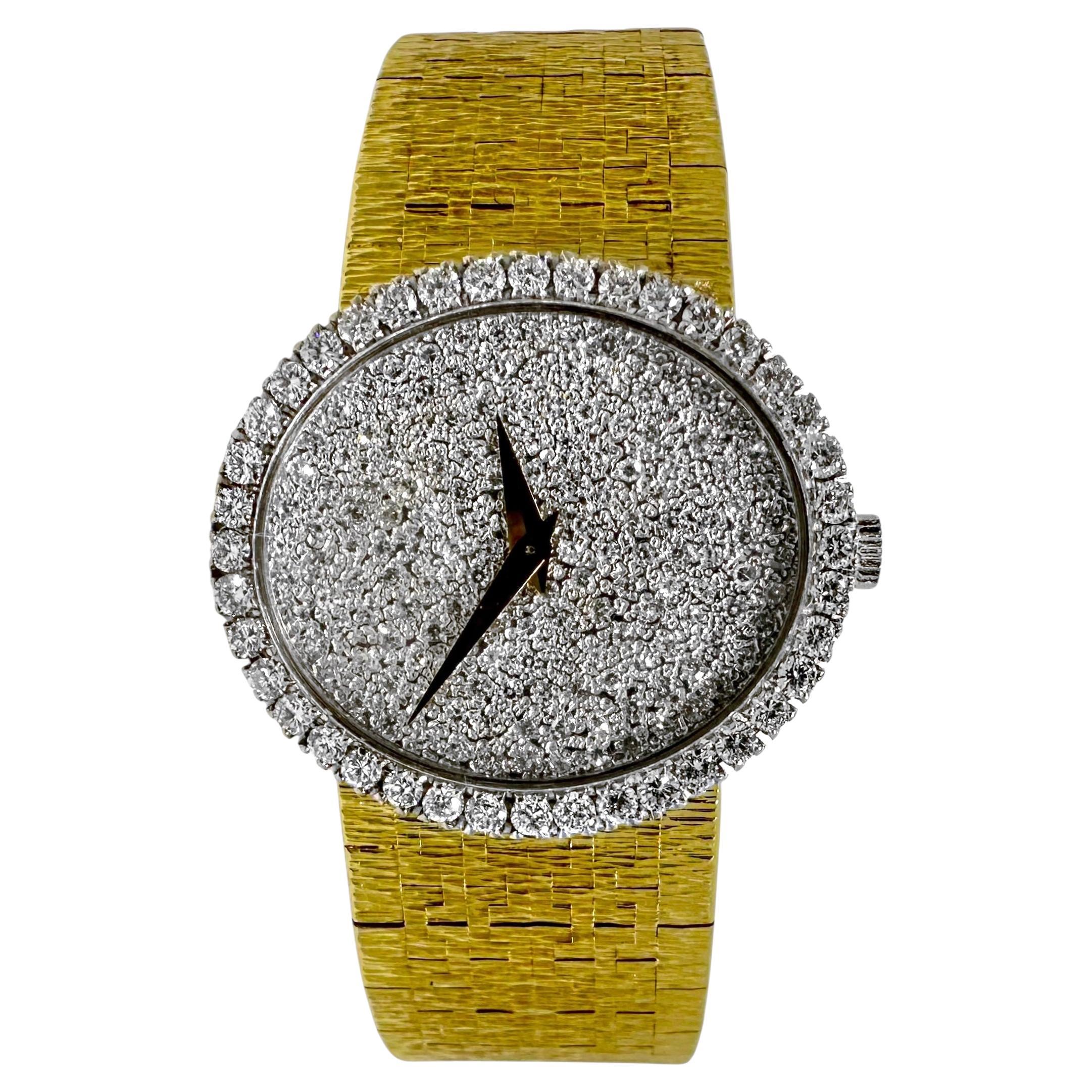 Dazzling Ladies Late 1970
s Piaget Watch in 18K Gold w/Oval Diamond Dial 
Bezel