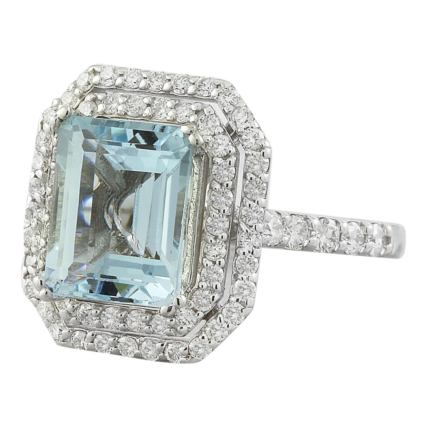 Introducing our exquisite 4.35 Carat Aquamarine 14K White Gold Diamond Ring. Crafted from stamped 14K White Gold, this ring has a total weight of 6.1 grams, ensuring both quality and durability. The focal point is a captivating aquamarine gemstone