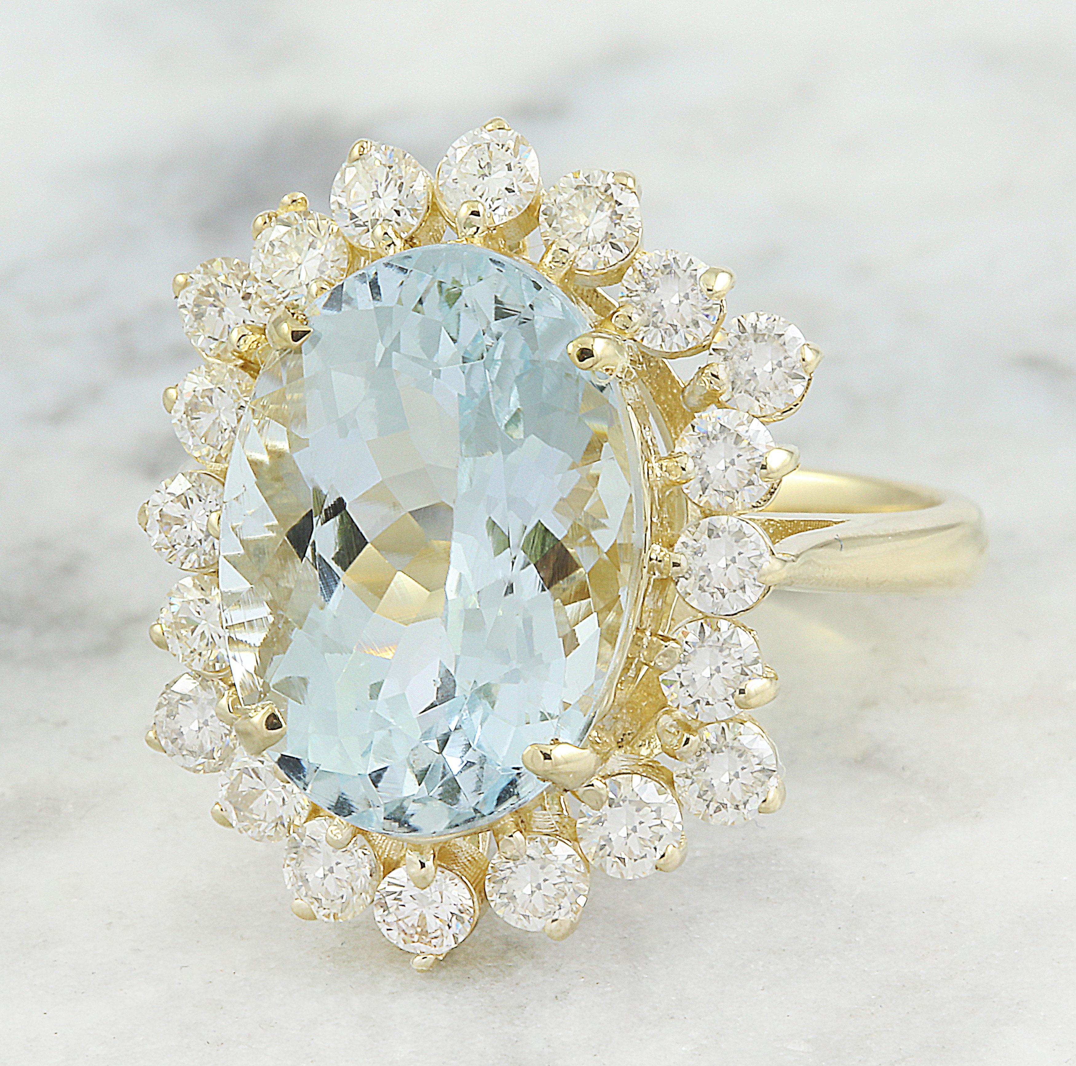 Elevate your elegance with our 10.40 carat aquamarine diamond ring in 14K yellow gold. Featuring a captivating 5.90 carat aquamarine and 1.10 carats of diamonds, this ring is a statement of sophistication. With a total weight of 6 grams and a face