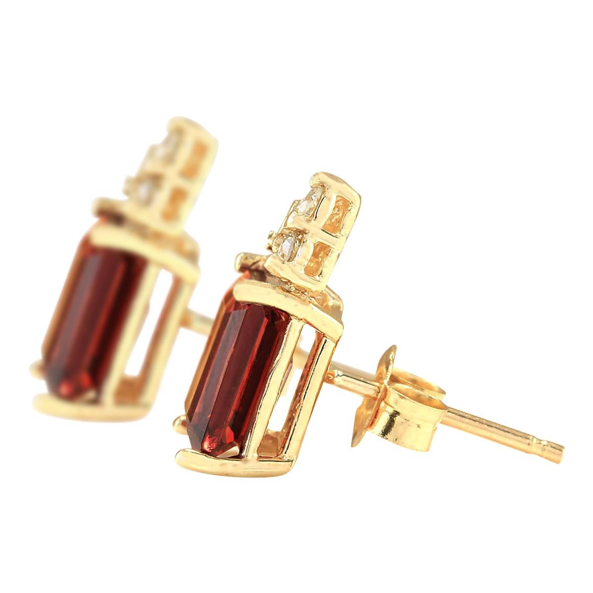 Introducing our stunning 2.65 Carat Natural Garnet Earrings, a captivating addition to your jewelry collection. Crafted in luxurious 14K Yellow Gold and stamped for authenticity, these earrings exude sophistication and charm. These earrings feature