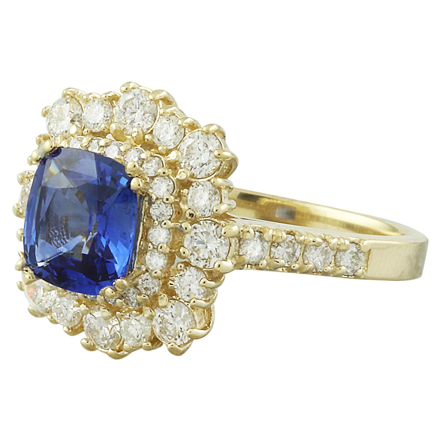 Adorn your hand with elegance and grace wearing this exquisite 1.70 Carat Natural Tanzanite 14K Solid Yellow Gold Diamond Ring. Crafted with precision, the ring bears the distinguished 14K stamp, ensuring its authenticity. Weighing 4.3 grams, it