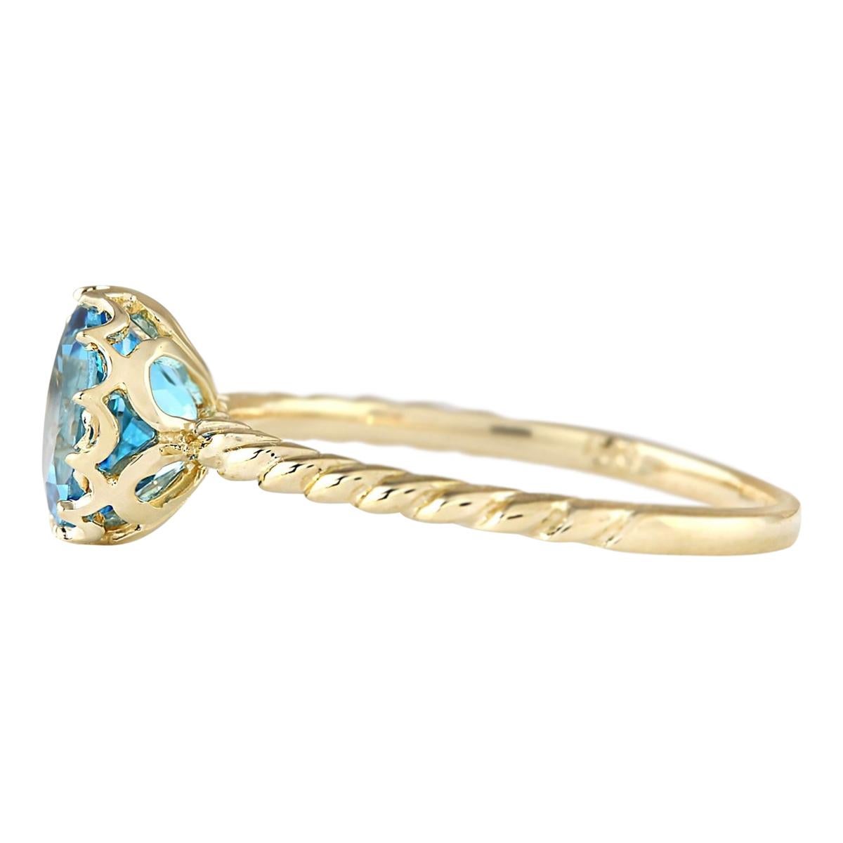 Introducing our stunning 14 Karat Yellow Gold Ring adorned with a breathtaking 1.50 Carat Natural Topaz gemstone. Stamped for authenticity, this ring weighs a mere 1.2 grams, ensuring comfort and wearability. The Topaz gemstone, boasting a weight of