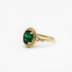Dazzling Rock 14K Gold Lab Emerald Halo Ring