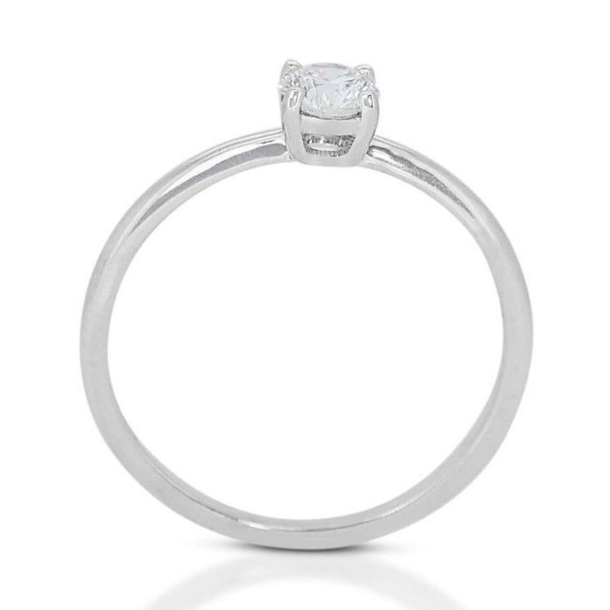 Women's Dazzling Solitaire Diamond Ring set in 18K White Gold