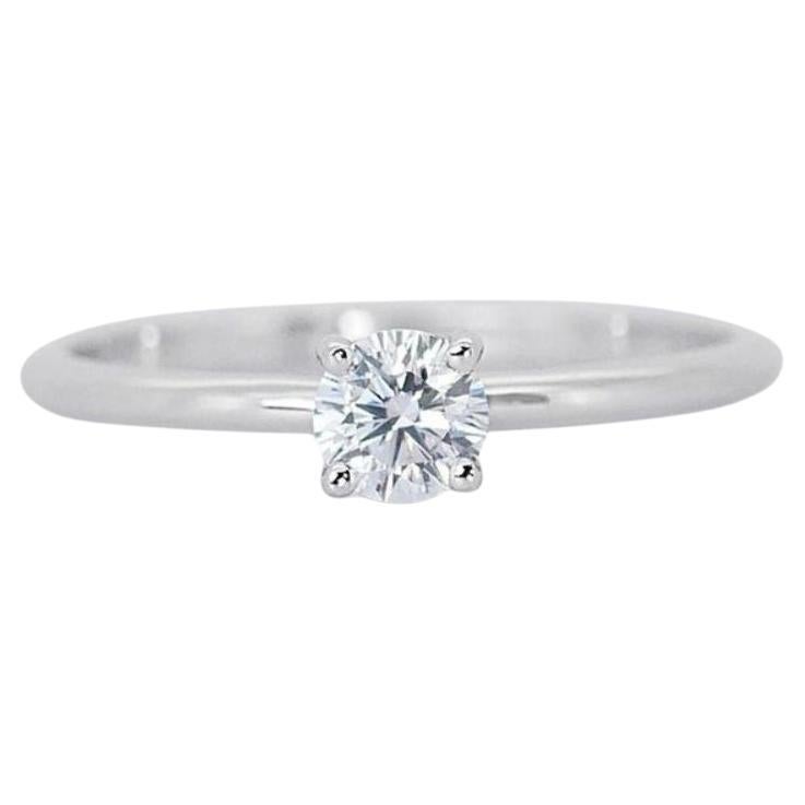 Dazzling Solitaire Diamond Ring set in 18K White Gold
