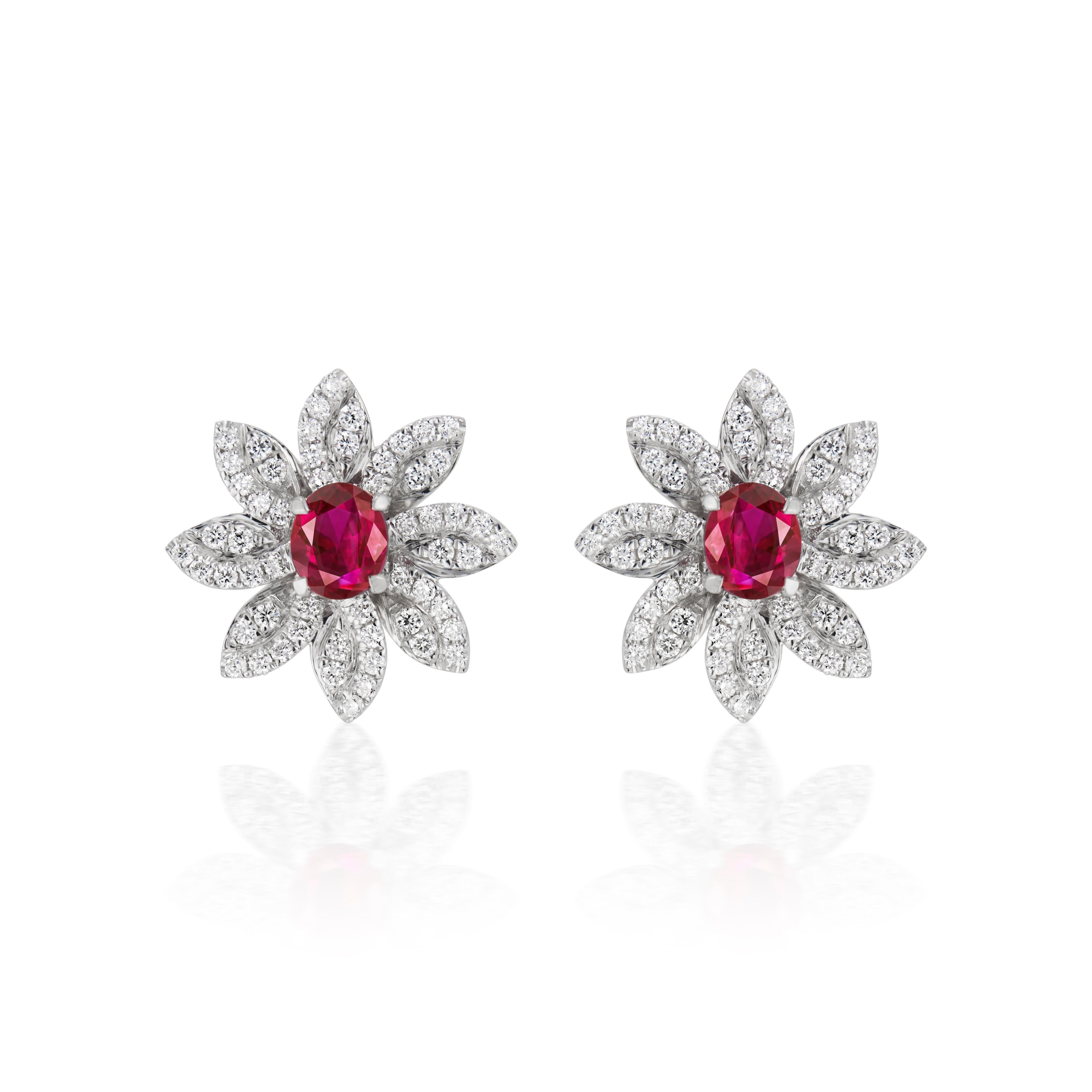 18K WHITE GOLD 
112 DIAMONDS, 0.74 CARATS
2 NO-HEAT BURMESE RUBIES, 1.52 CARATS
GIA Certified

Introducing our exquisite Flower Studs, a true marvel of our craftsmanship. These stunning studs feature two magnificent Burmese No Heat Rubies, weighing