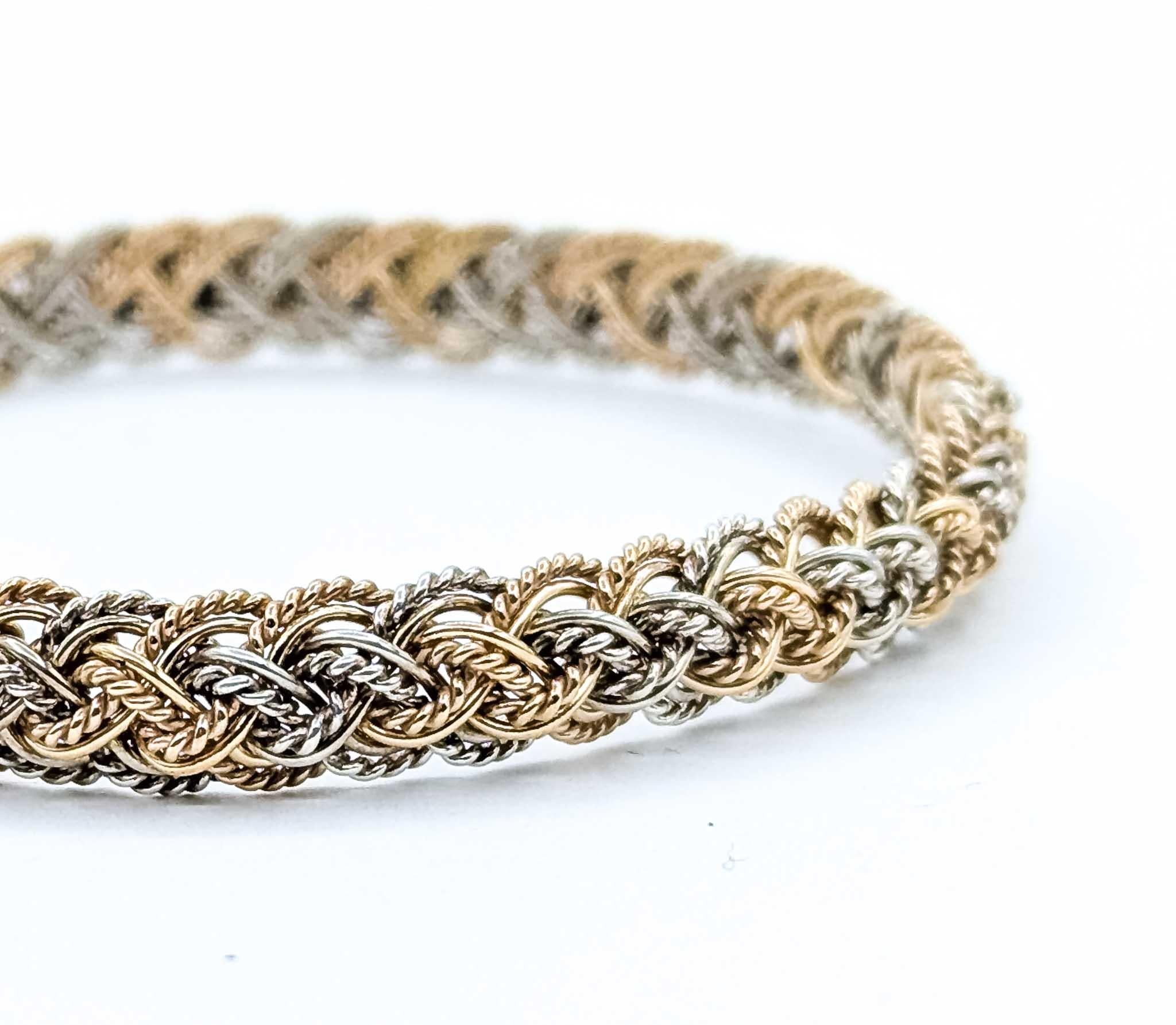 Dazzling Woven Bracelet in 14k Tri-Color Gold

Introduce an artistic flair to your ensemble with our dazzling woven Bracelet crafted in 14k Tri-Color Gold. This exquisite piece showcases a harmonious blend of white, yellow, and rose gold, woven into
