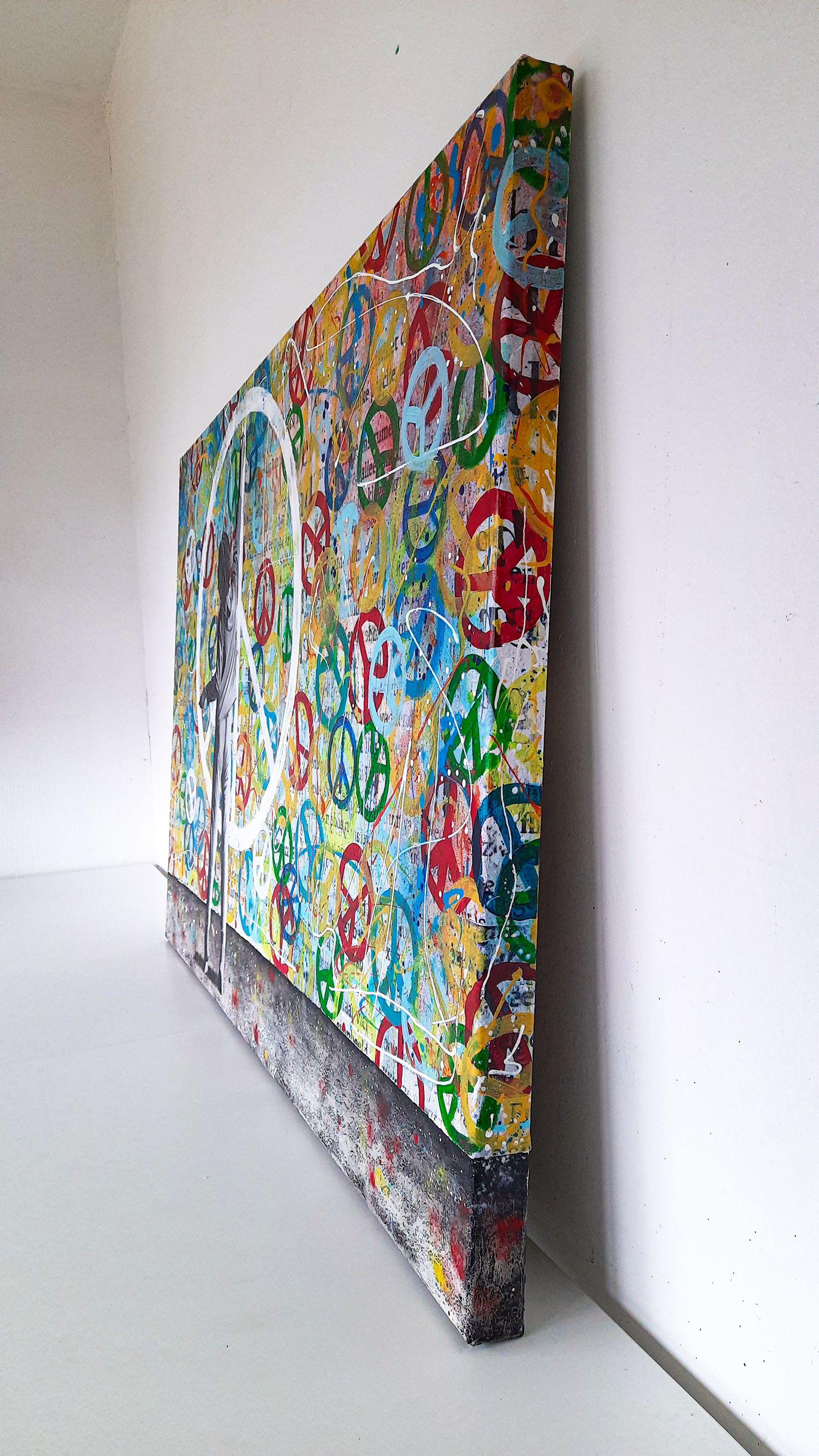 A child makes a graffiti painting with 'peace signs' on the wall. Because there is a lot of unrest and wars in the world, it wants to show that there should be peace.    The symbol designed for the British nuclear disarmament movement in 1958 is now