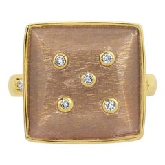 Anello DBD con pietra di luna dorata e diamante