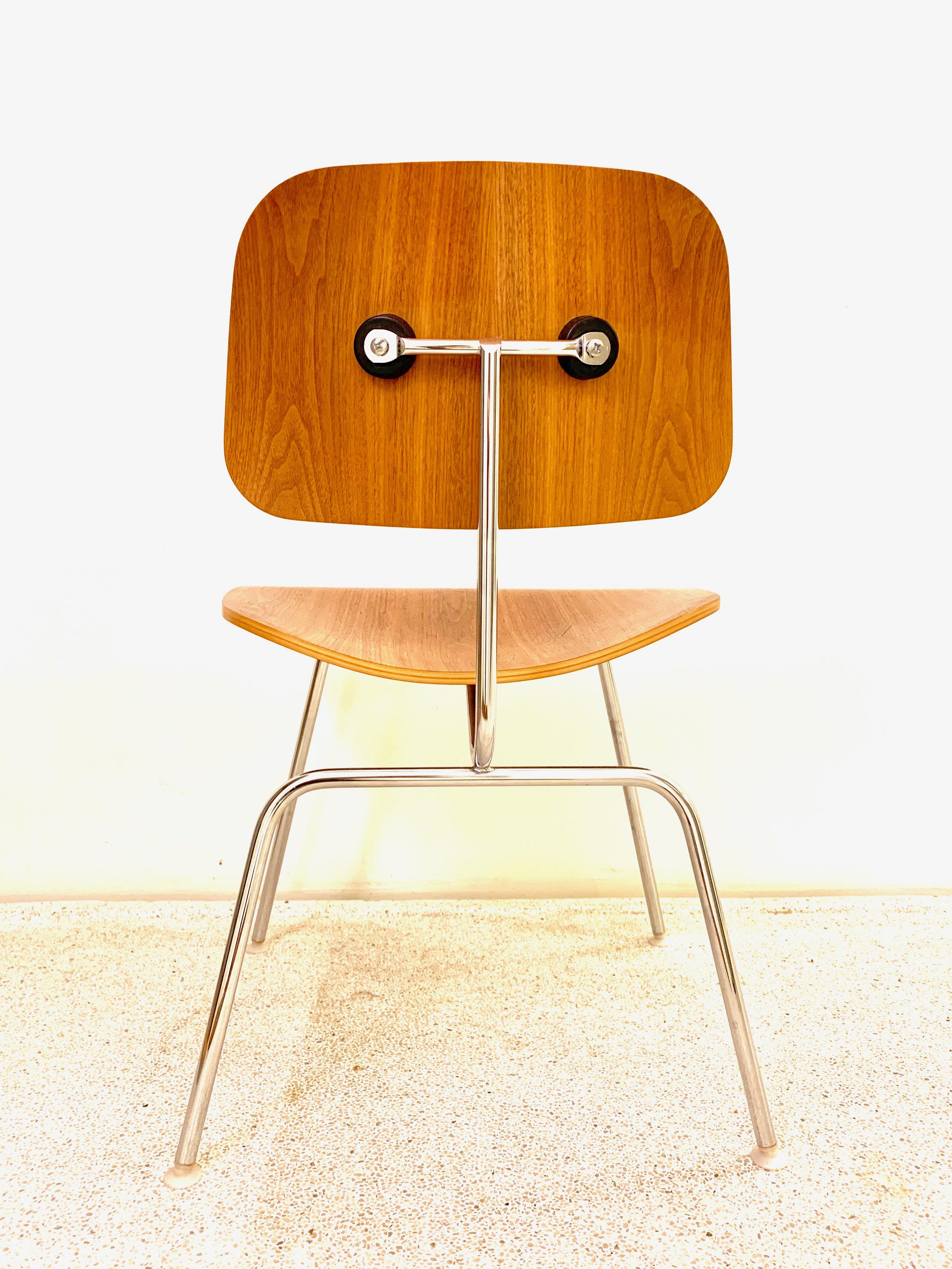 Walnut plywood on chrome frame dining chair metal. Manufactured by Herman Miller. This chair has been part of the Vipp showroom in New York and was later shipped with the Vipp family to their private residence in Dragør Copenhagen. We have four if