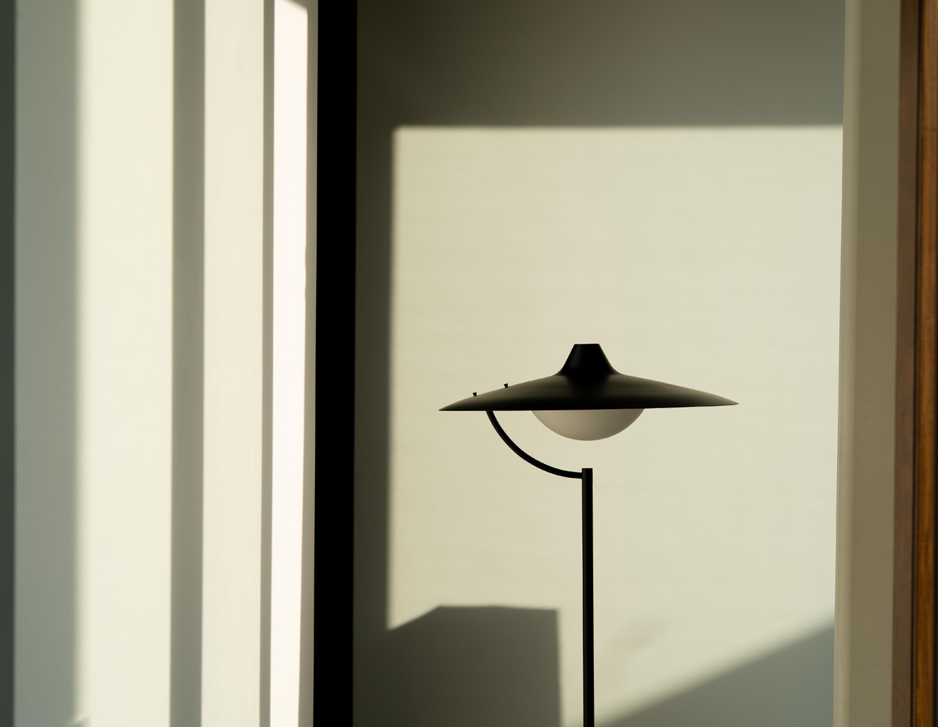 DCW Editions Biny Floor Lamp in Black Steel by Jacques Biny
 
A rigorous elegance. A dimmer and two gelatins, to regulate the intensity and warmth of the light; adjustable feet, to adapt to the floors.
 
Jacques Biny is a major French luminary from