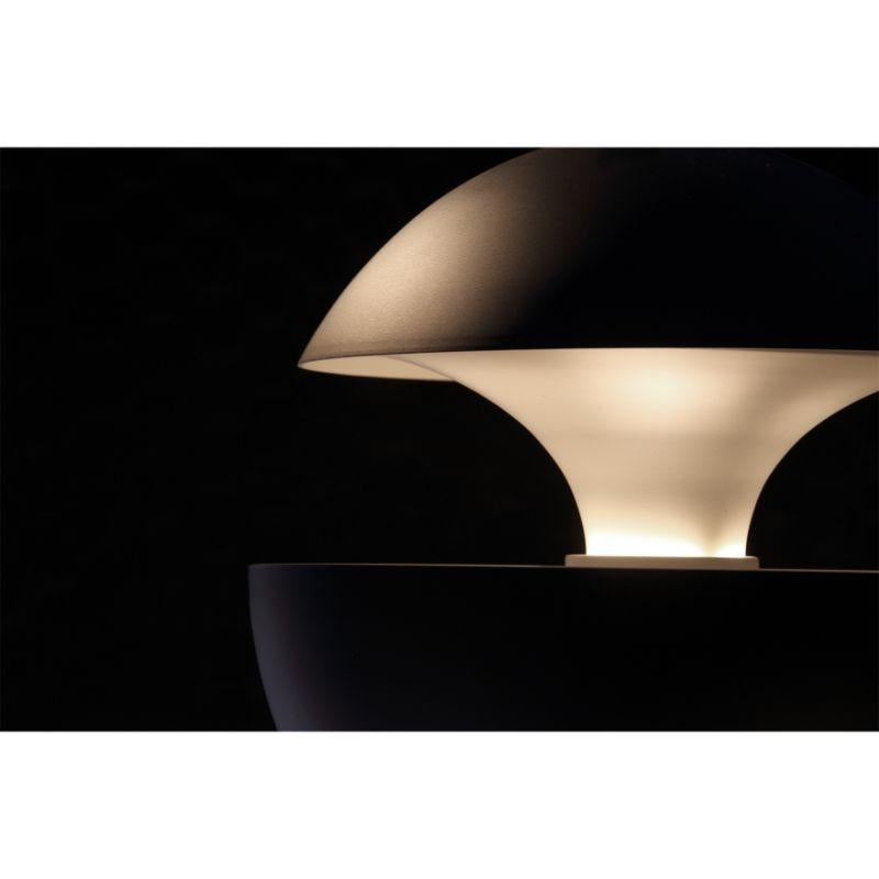 DCW Editions Here Comes the Sun 175 Pendant Lamp in Black White Aluminium by Bertrand Balas
 
 Bertrand Balas, architect born in Toulouse in 1935 likes to watch the sun set over the Garonne river. With that musical lilt typical of the south, he