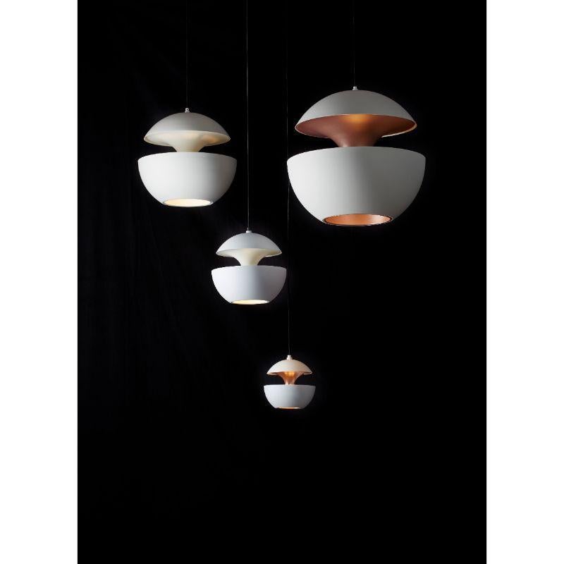 DCW Editions Here Comes the Sun 175 Pendant Lamp in White Aluminium by Bertrand Balas
 
 Bertrand Balas, architect born in Toulouse in 1935 likes to watch the sun set over the Garonne river. With that musical lilt typical of the south, he likes to