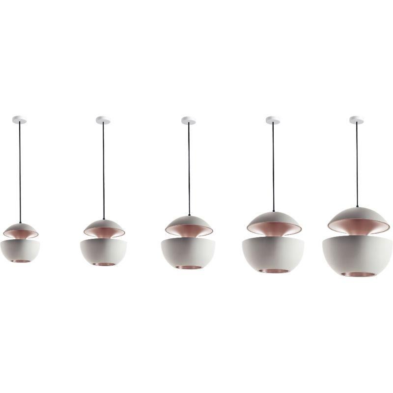 DCW Editions Here Comes the Sun 175 Pendant Lamp in White Pink Copper Aluminium by Bertrand Balas
 
 Bertrand Balas, architect born in Toulouse in 1935 likes to watch the sun set over the Garonne river. With that musical lilt typical of the south,