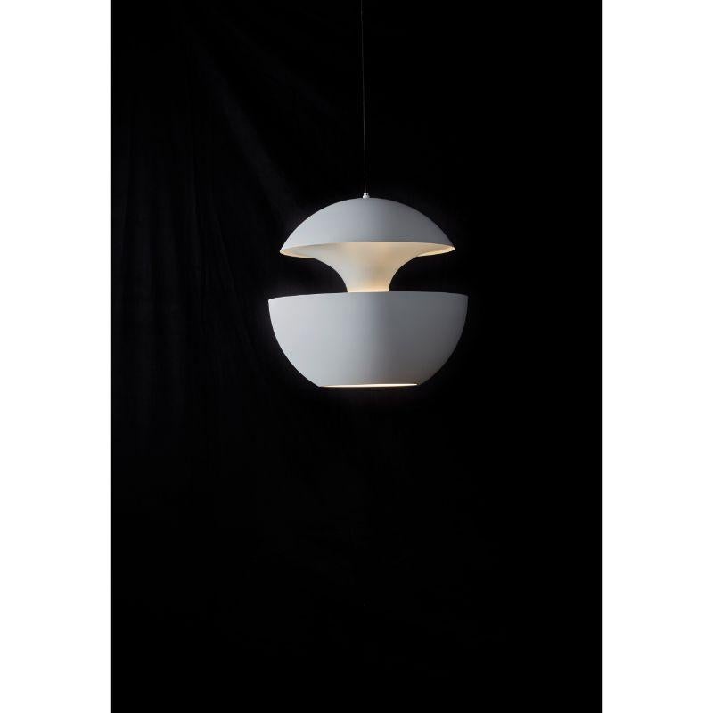 DCW Editions Here Comes the Sun 250 Pendant Lamp in White Aluminium by Bertrand Balas
 
 Bertrand Balas, architect born in Toulouse in 1935 likes to watch the sun set over the Garonne river. With that musical lilt typical of the south, he likes to