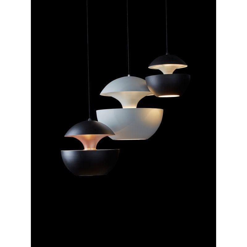 DCW Editions Here Comes the Sun 350 Pendant Lamp in White Aluminium by Bertrand Balas
 
 Bertrand Balas, architect born in Toulouse in 1935 likes to watch the sun set over the Garonne river. With that musical lilt typical of the south, he likes to