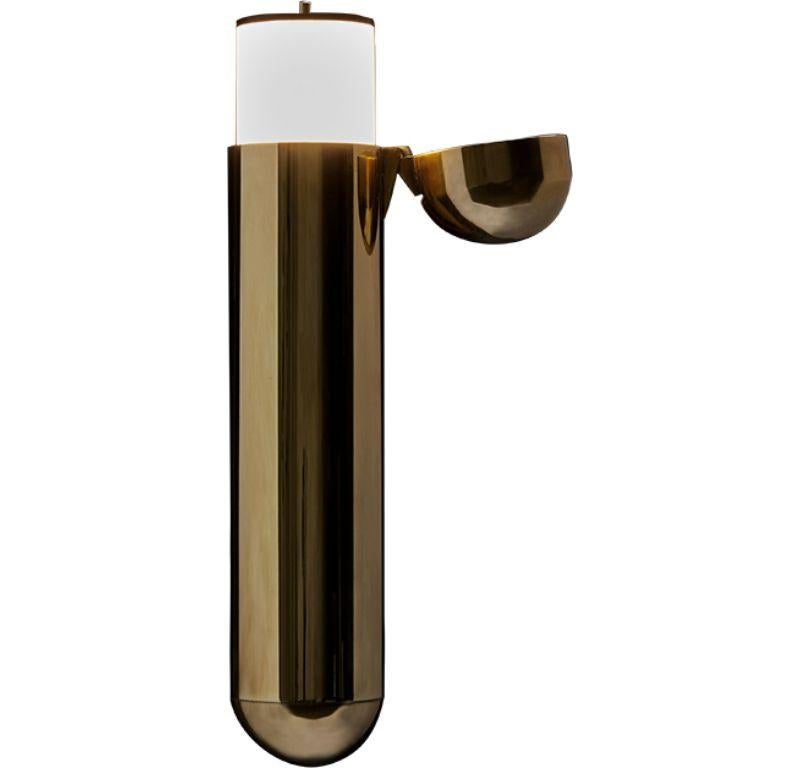 DCW Editions ISP Wall Lamp in Brass with Right Opening by Ilia Sergeevich Potemine
 
 What is it ? A mystery ? An object from outer space ? From what period of history did it emerge? Which era ? Who could have invented such an object ? These are the