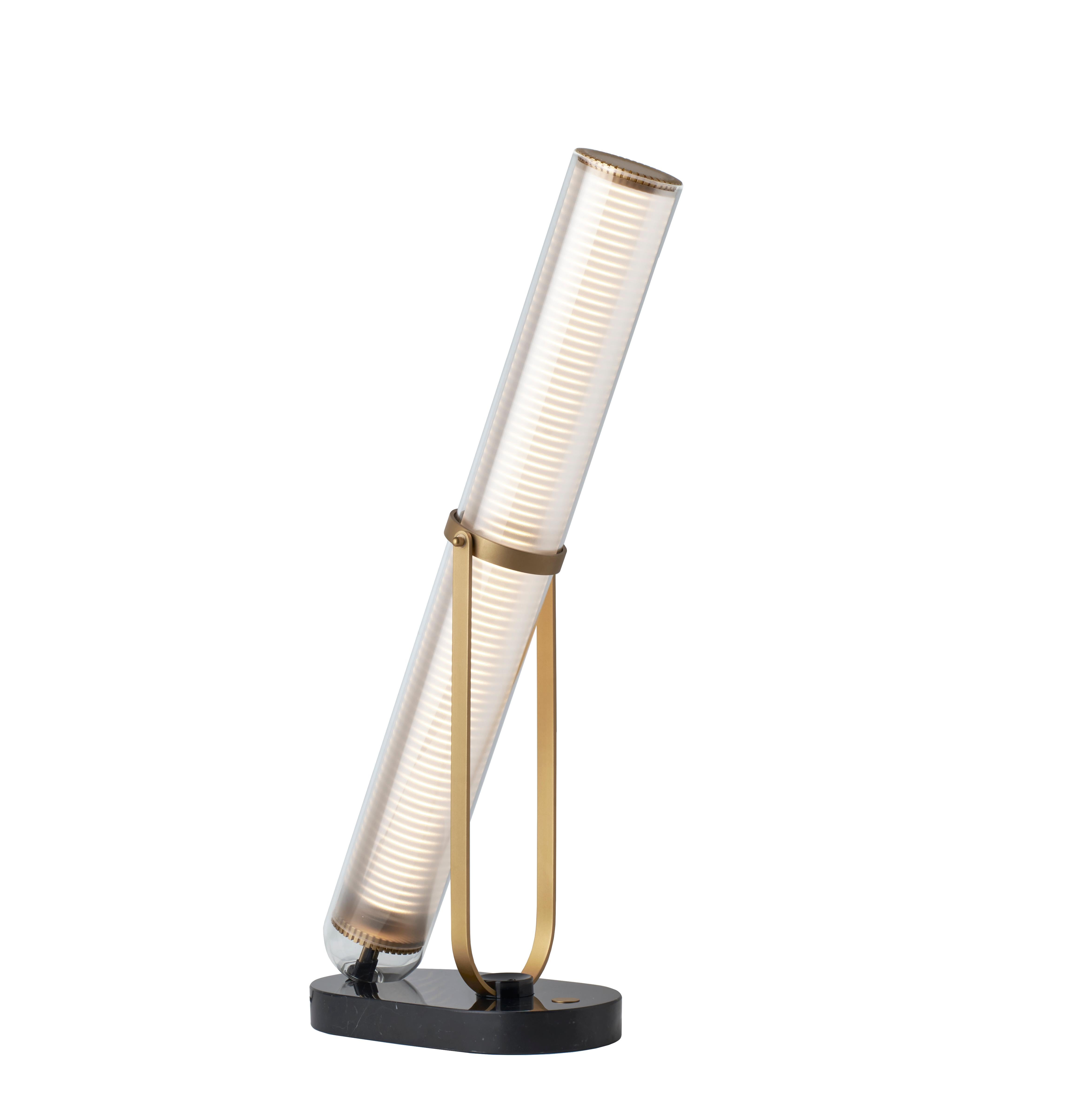 DCW Editions La Lampe Frechin Table Lamp in Gold Black by Jean-Louis Frechin
 
 La Lampe Frechin is a table and floor lamp composed of a base in black marble and anodized aluminum, and a borosilicate tube. By confronting timeless material with a
