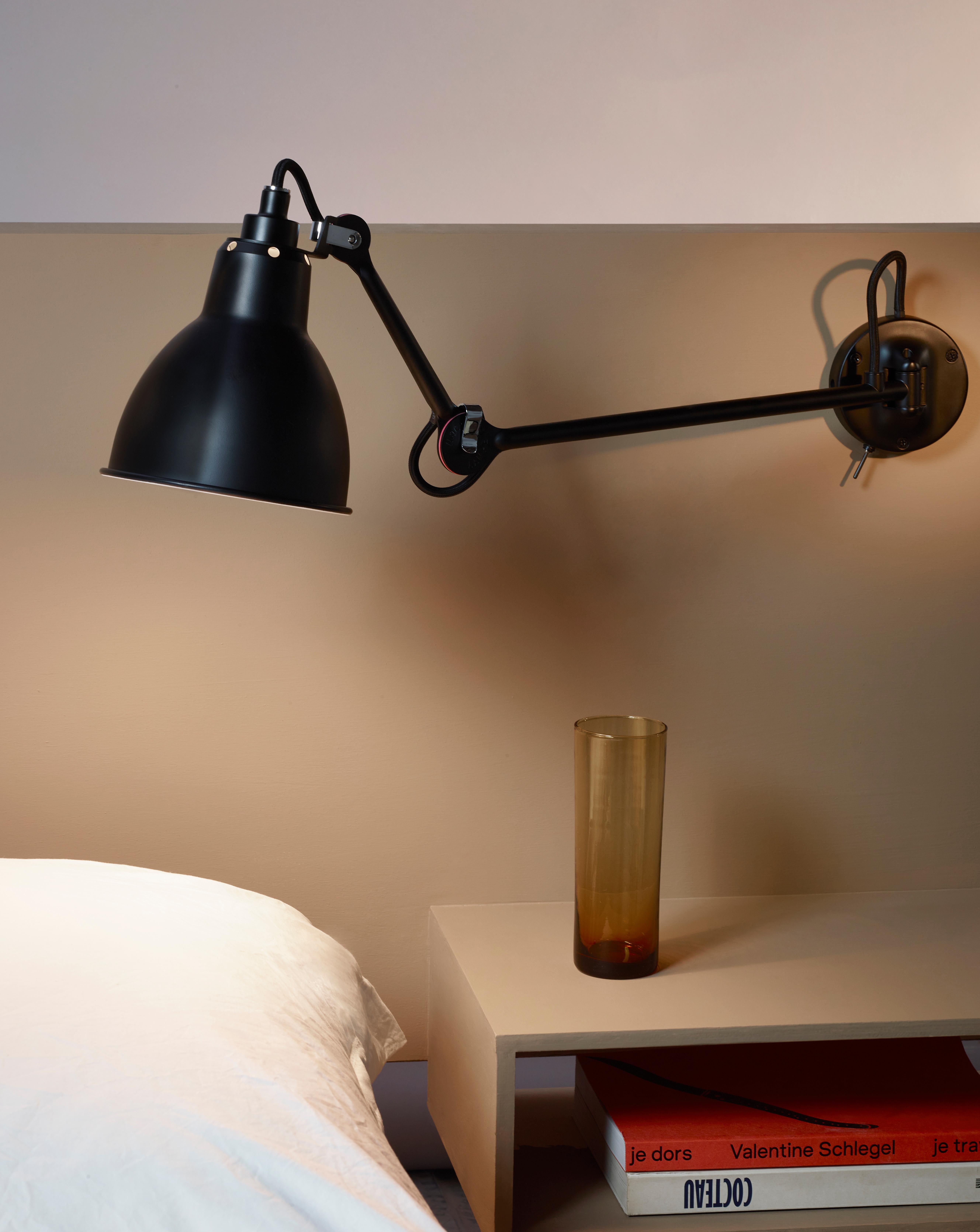 DCW Editions Lampe Gras N°204 SW Wall Lamp in Black Steel Arm and Brass Shade by Bernard-Albin Gras
 
 In 1921 Bernard-Albin GRAS designed a series of lamps for use in offices and in industrial environments. The GRAS lamp, as it was subsequently