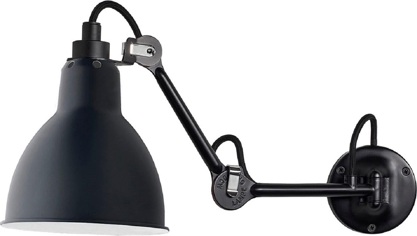 DCW Editions Lampe Gras N°204 Wall Lamp in Black Steel Arm and Blue Shade by Bernard-Albin Gras
 
 In 1921 Bernard-Albin GRAS designed a series of lamps for use in offices and in industrial environments. The GRAS lamp, as it was subsequently called,