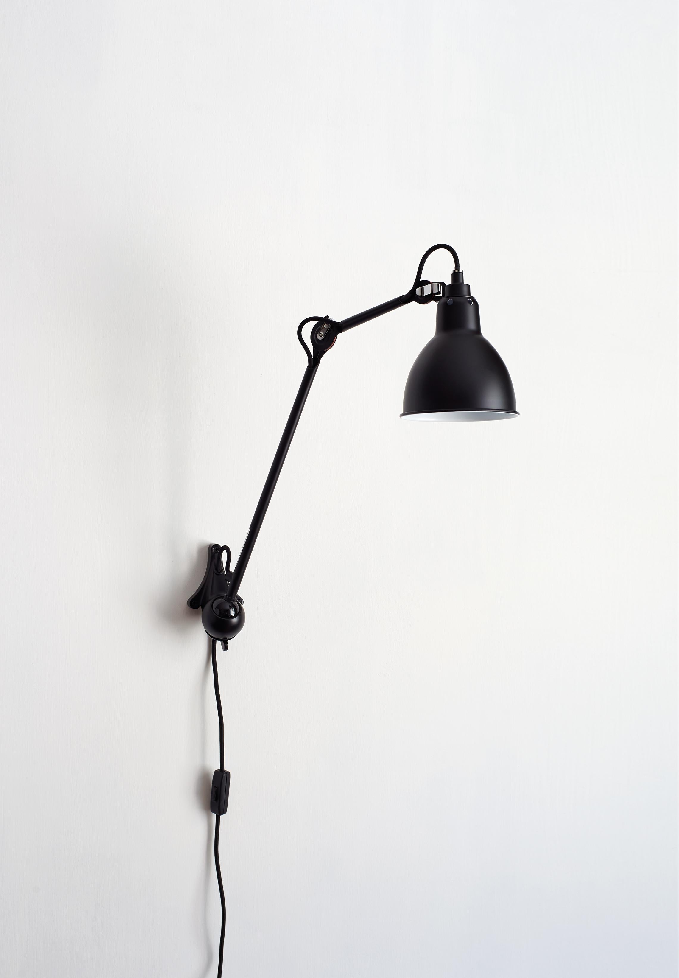 DCW Editions La Lampe Gras N°222 Wall Lamp in Black Steel Arm and Black Copper Shade by Bernard-Albin Gras
 
 In 1921 Bernard-Albin GRAS designed a series of lamps for use in offices and in industrial environments. The GRAS lamp, as it was
