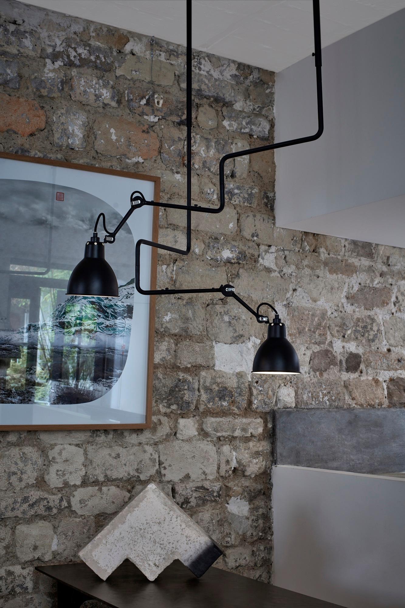 DCW Editions La Lampe Gras N°312 L Pendant Lamp in Black Steel Arm and Black Copper Shade by Bernard-Albin Gras
 
 We have decided to edit a very distinctive hanging lamp, very graphic, practical with its extension (you can adjust the height of the