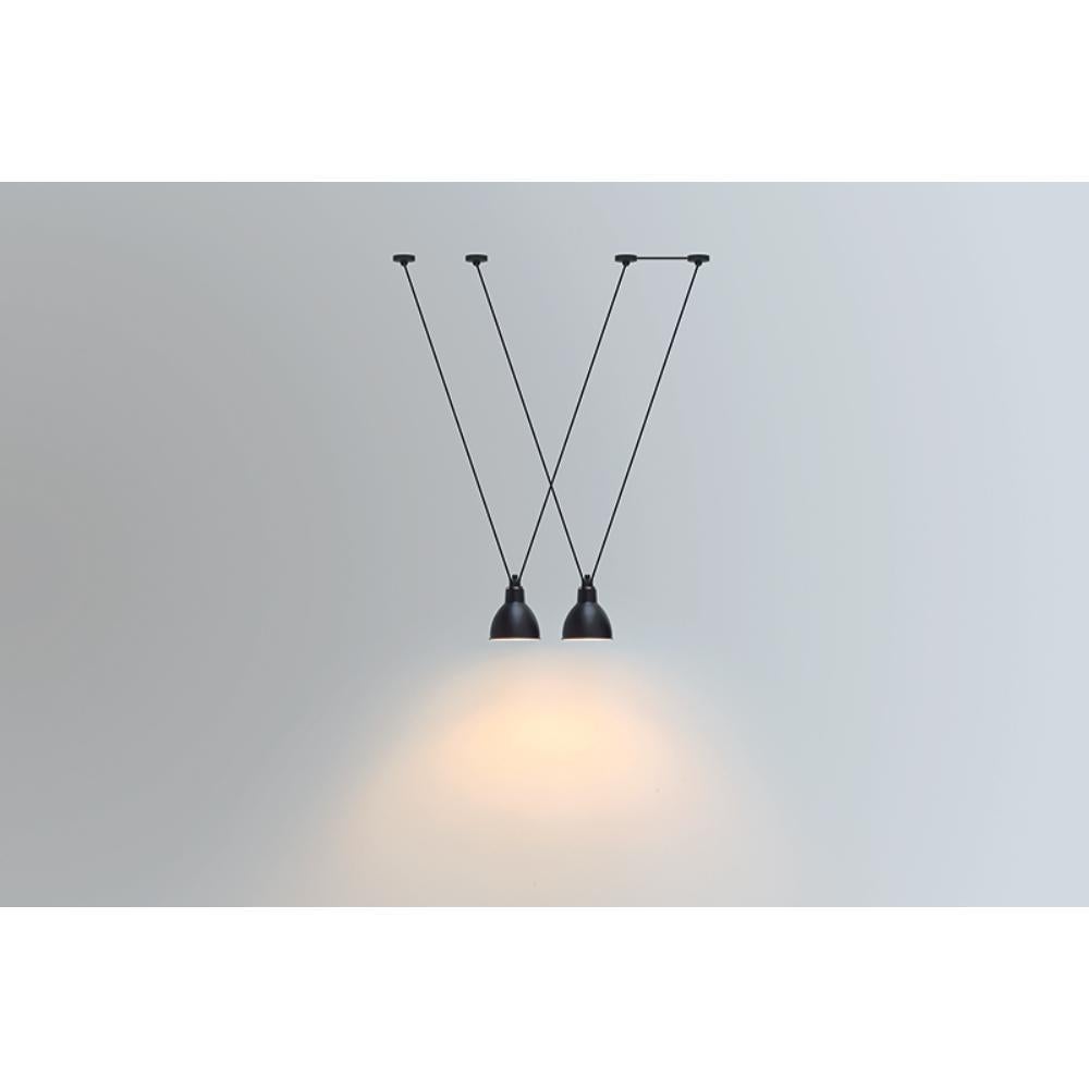 DCW Editions Les Acrobates N°323 Large Round Pendant Lamp in Black Steel Arm and Frosted Glass Shade by Bernard-Albin Gras
 
Les Acrobates de GRAS are adept at doing tricks high in the air, way above the ground. The high wire flyers (Nº323, Nº324,