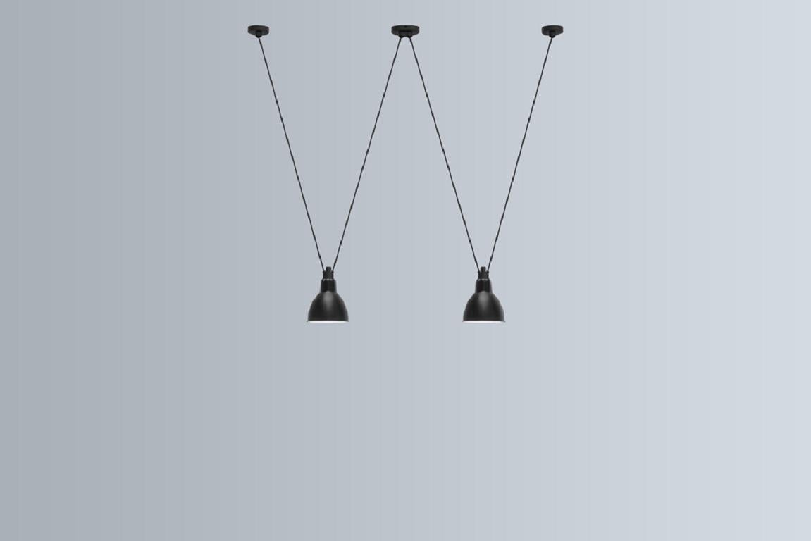 DCW Editions Les Acrobates N°324 Large Round Pendant Lamp in Black Steel Arm and Black Shade by Bernard-Albin Gras
 
 Les Acrobates de GRAS are adept at doing tricks high in the air, way above the ground. The high wire flyers (Nº323, Nº324, Nº325,