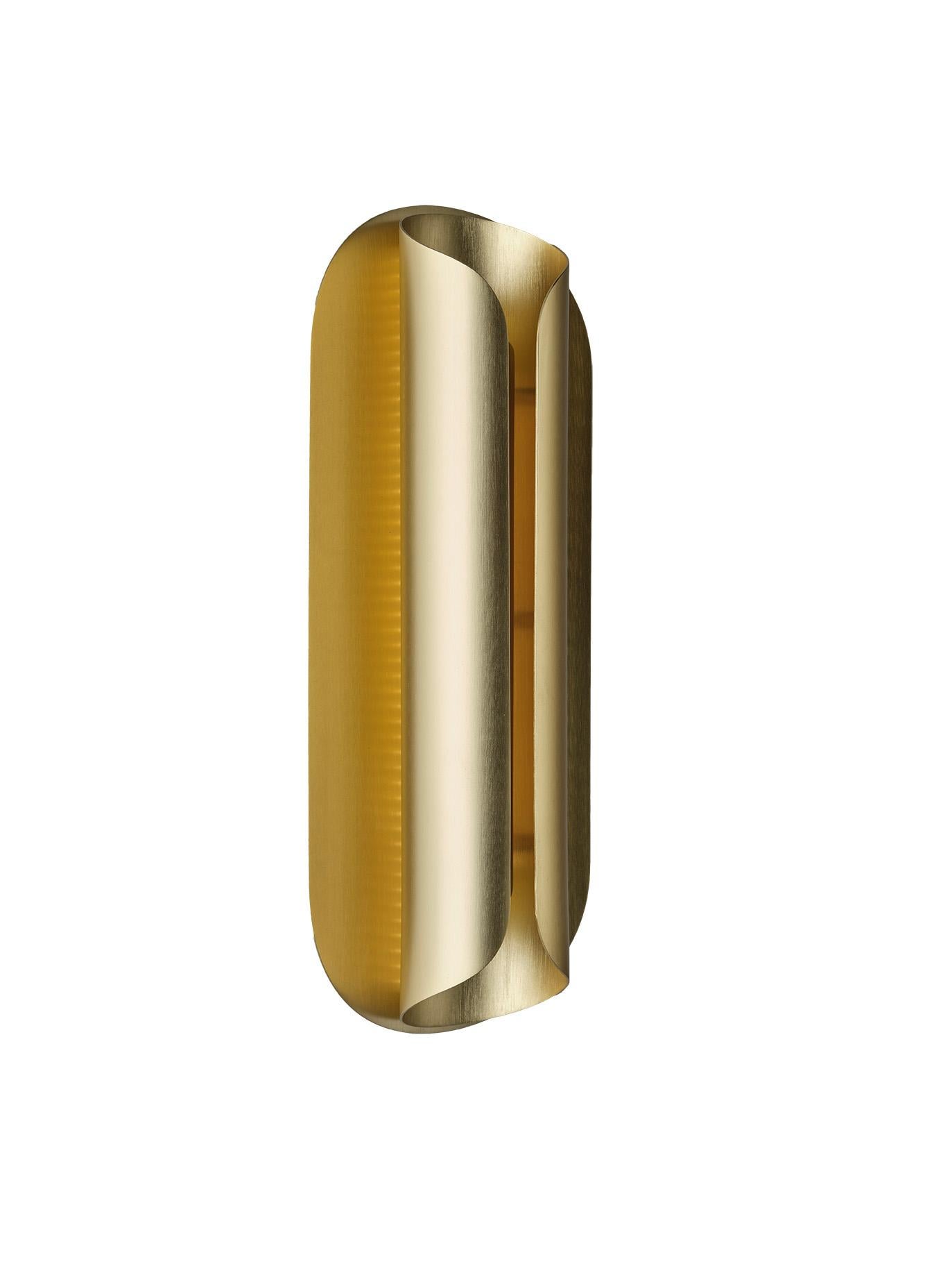 DCW Editions Rosalie Wall Lamp in Gold Aluminium by Julie Fuillet
 
 Across the globe, light evolves over time.
 From the soft and reassuring light of the candle to the raw LED brightness of the refrigerator light, centuries have passed.
 Are we at